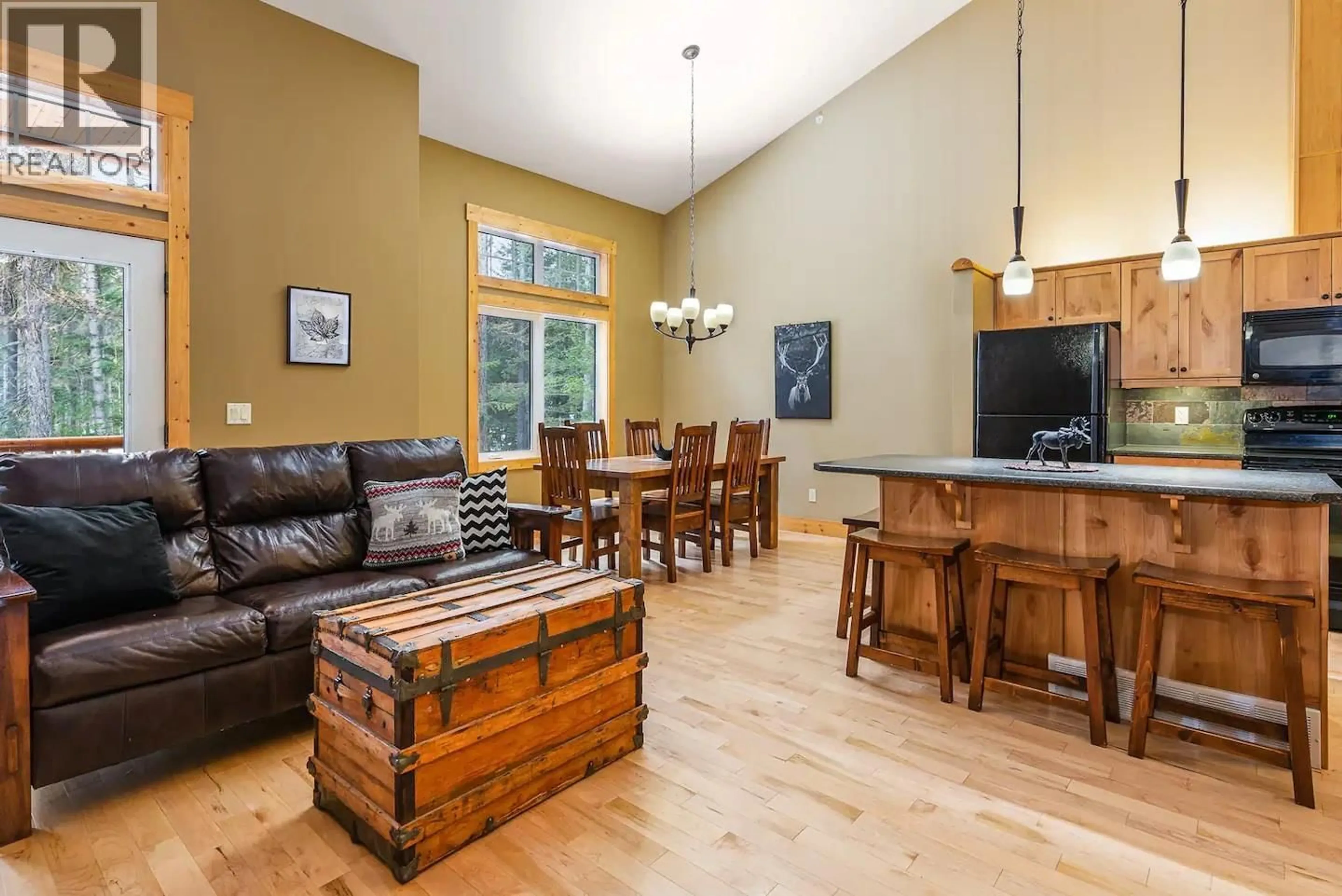 Living room with furniture, wood/laminate floor for 341 FAIRWAY DRIVE, Kimberley British Columbia V1A0B7