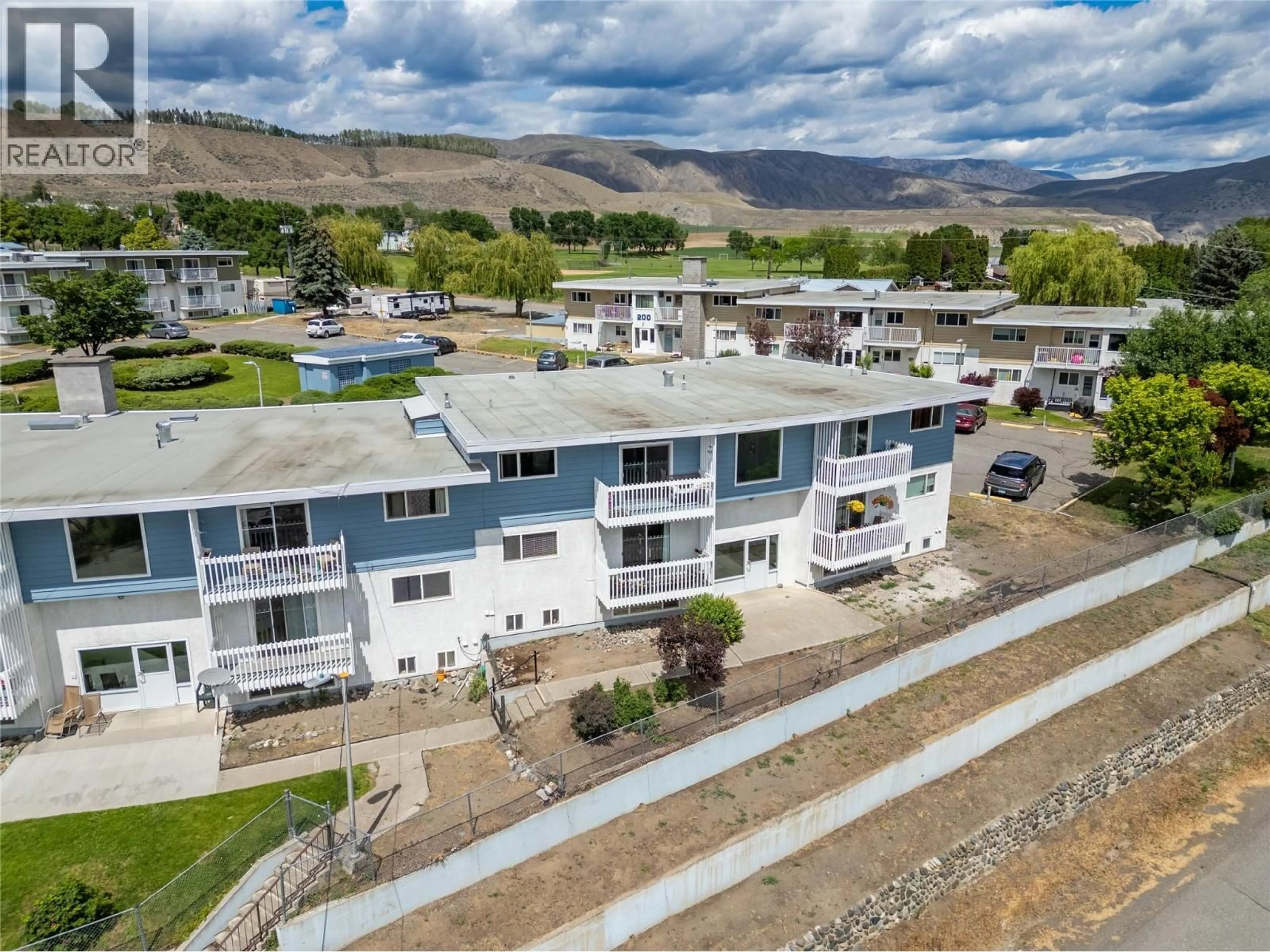 A pic from outside/outdoor area/front of a property/back of a property/a pic from drone, mountain view for 310 - 825 HILL STREET, Ashcroft British Columbia V0K1A0