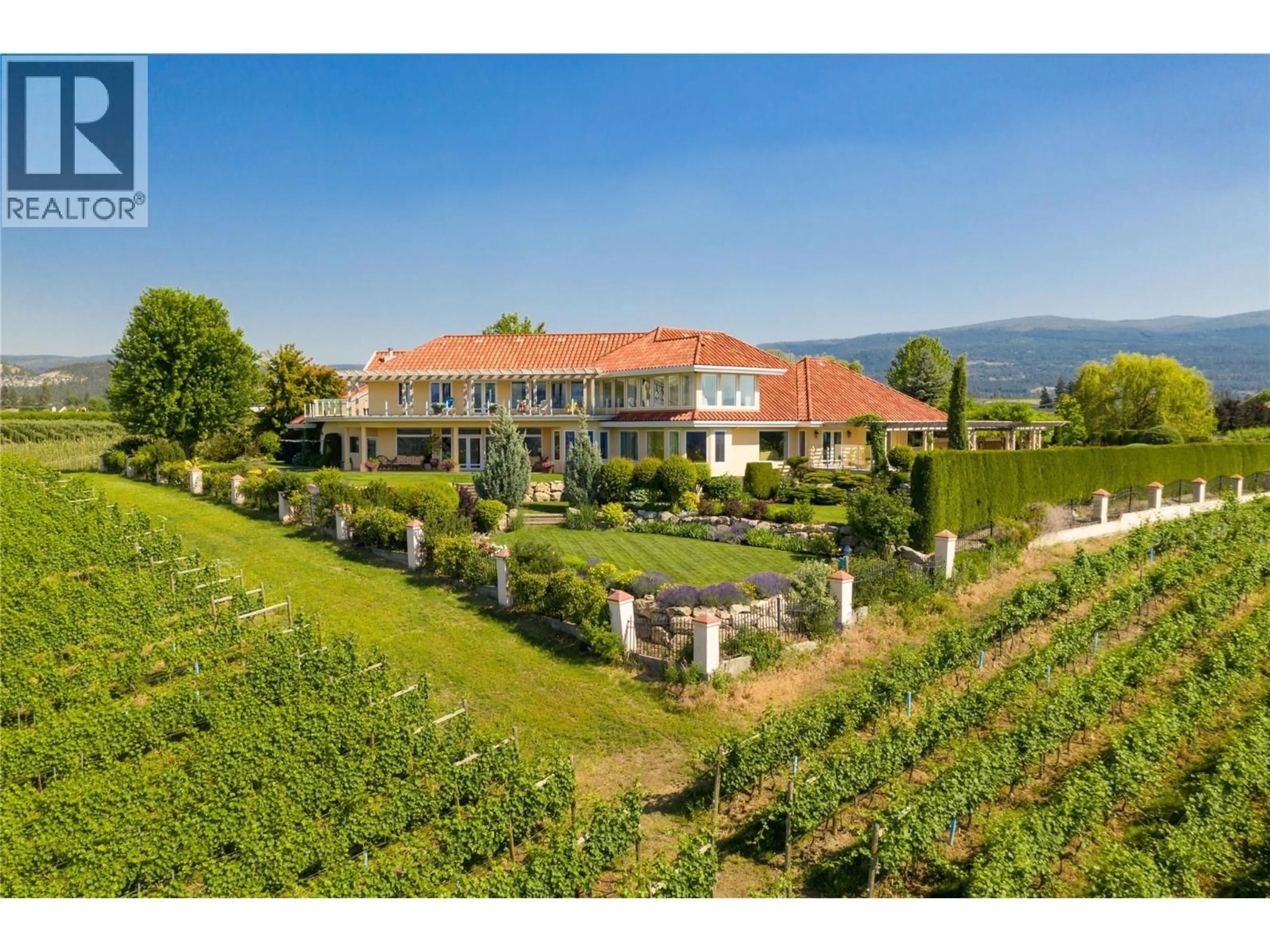 A pic from outside/outdoor area/front of a property/back of a property/a pic from drone, mountain view for 3240 POOLEY ROAD, Kelowna British Columbia V1W4G7