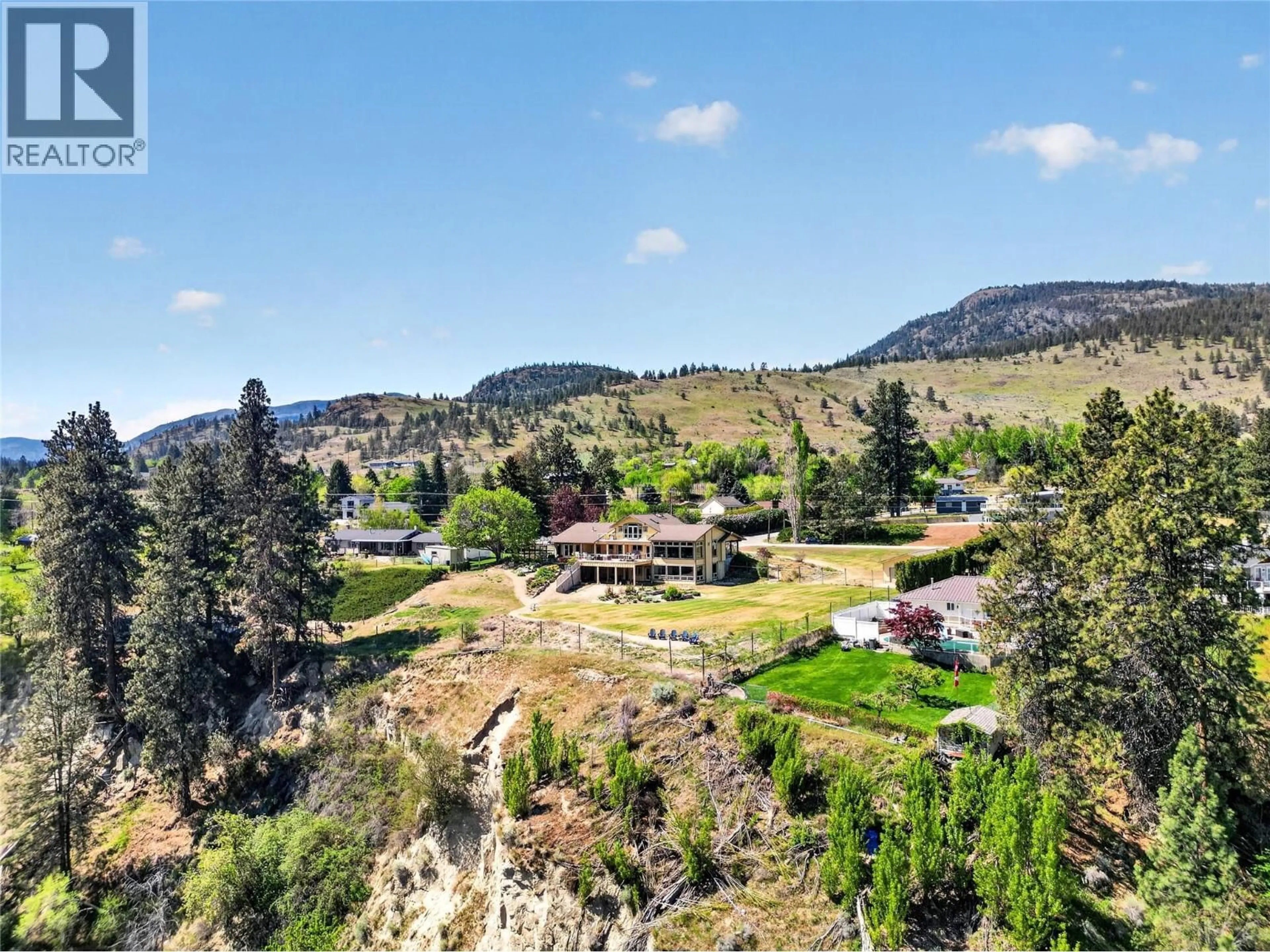 A pic from outside/outdoor area/front of a property/back of a property/a pic from drone, mountain view for 660 PINEVIEW DRIVE, Kaleden British Columbia V0H1K0