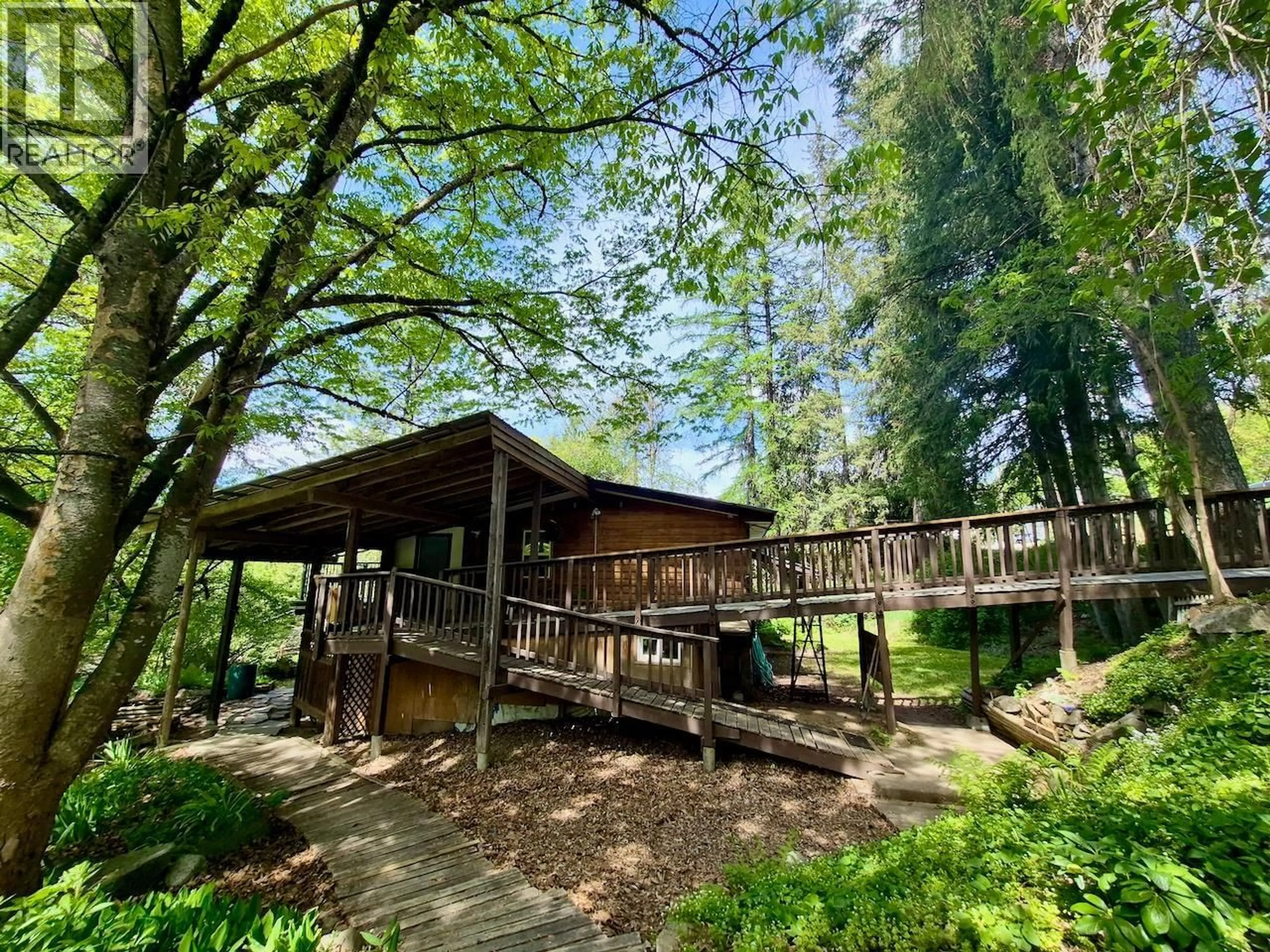 A pic from outside/outdoor area/front of a property/back of a property/a pic from drone, forest/trees view for 2010 CREEK STREET, Nelson British Columbia V1L1M7