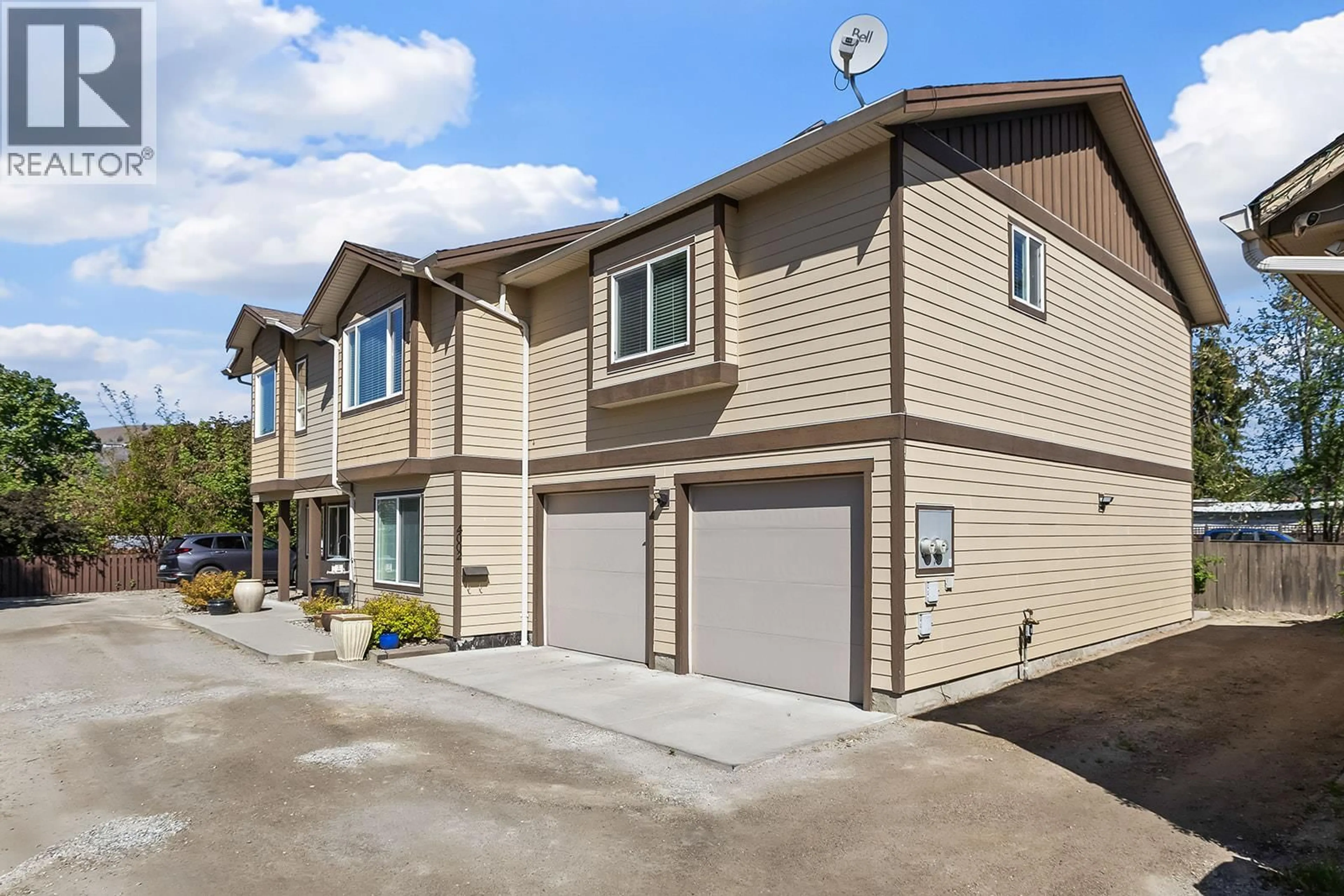 Home with vinyl exterior material, street for 4002 25 STREET, Vernon British Columbia V1T4R7