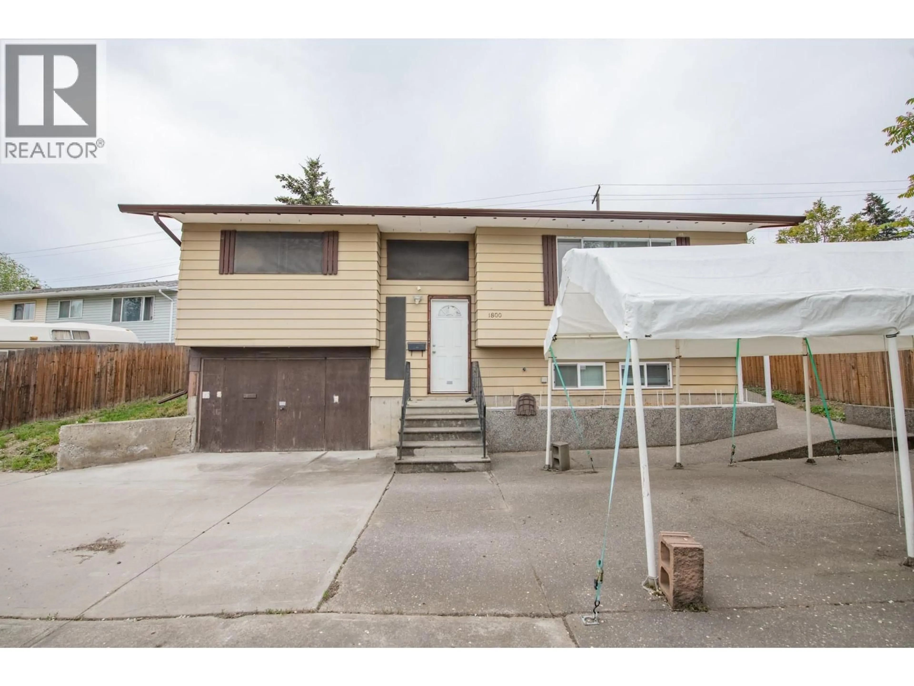 Home with vinyl exterior material, street for 1800 42 STREET, Vernon British Columbia V1T7C7