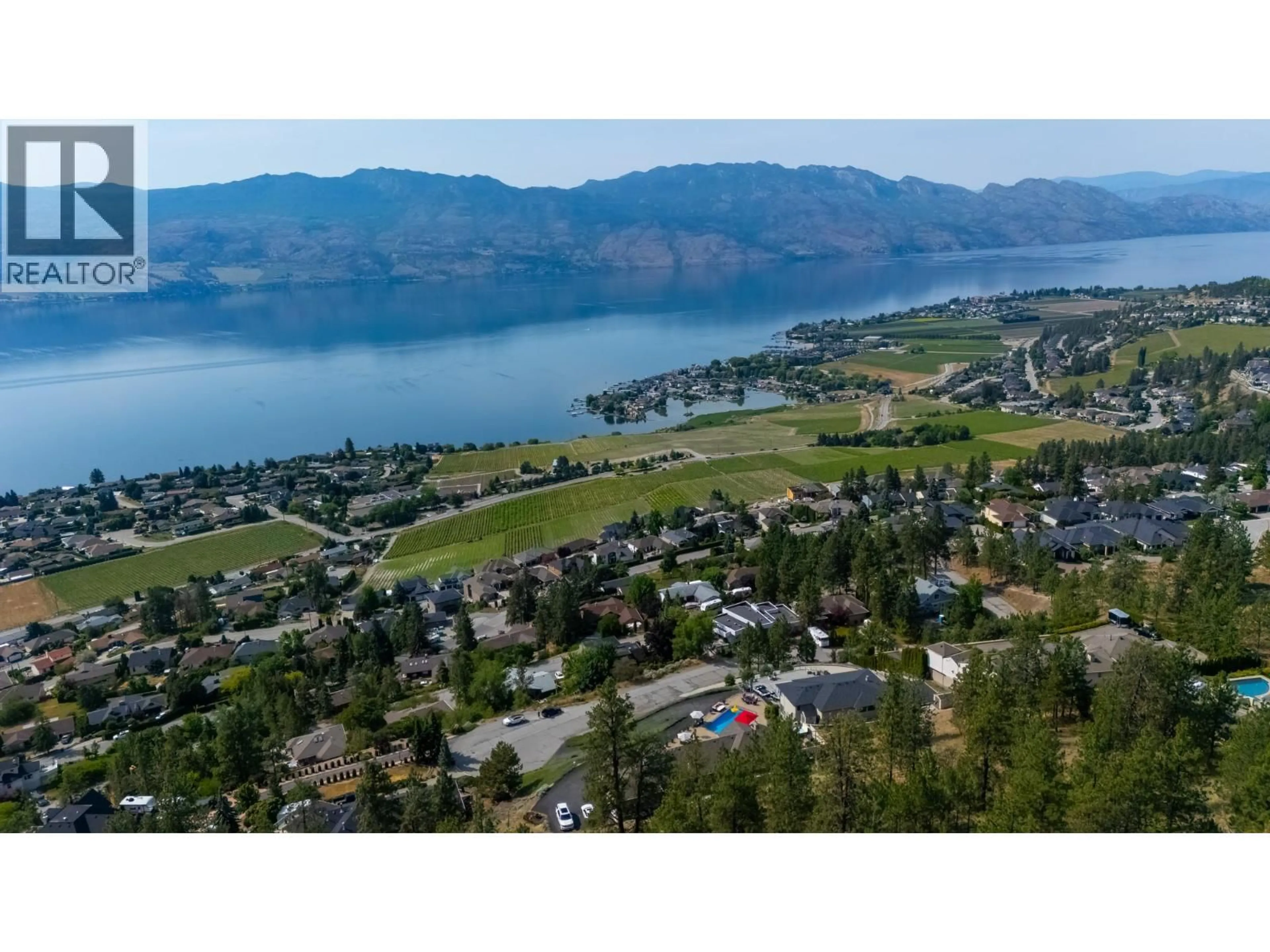 A pic from outside/outdoor area/front of a property/back of a property/a pic from drone, mountain view for 1260 TIMOTHY PLACE, West Kelowna British Columbia V1Z3N2