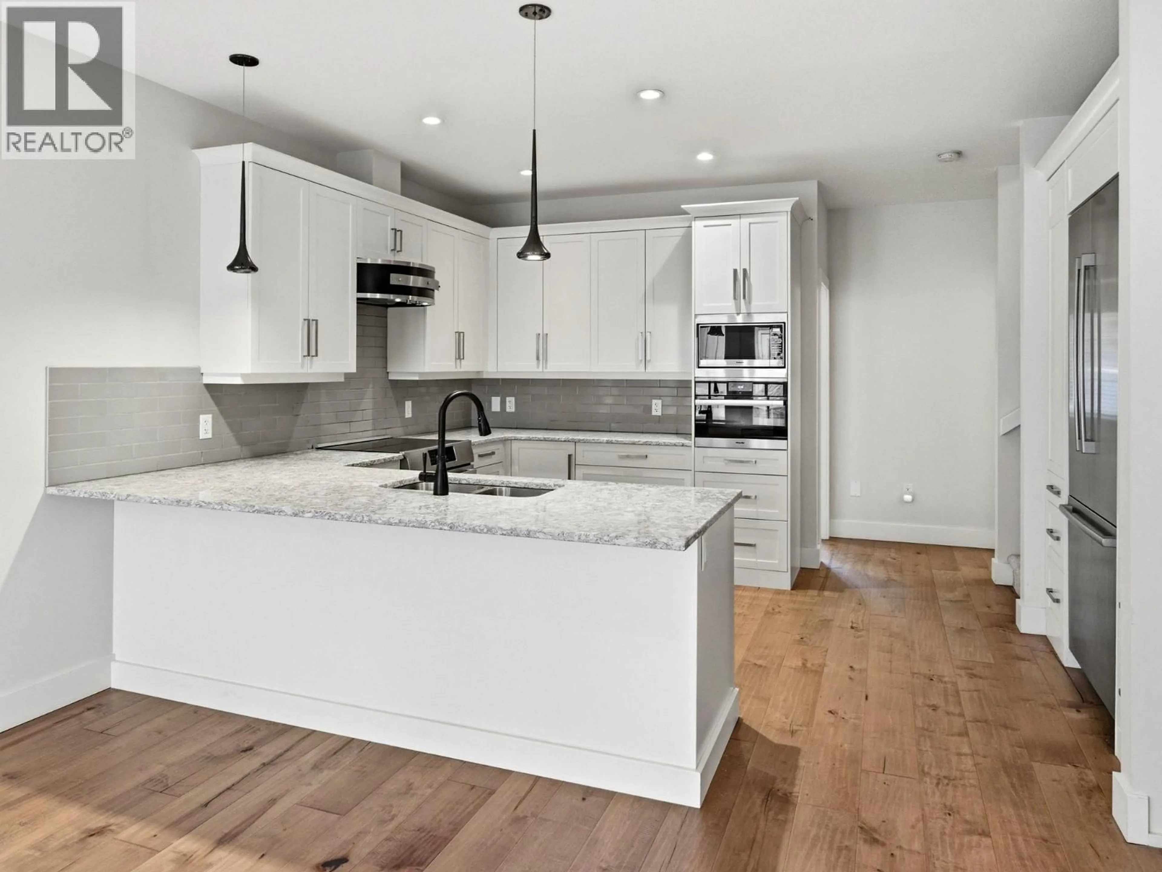 Open concept kitchen, unknown for 17 - 644 LEQUIME ROAD, Kelowna British Columbia V1W1A4