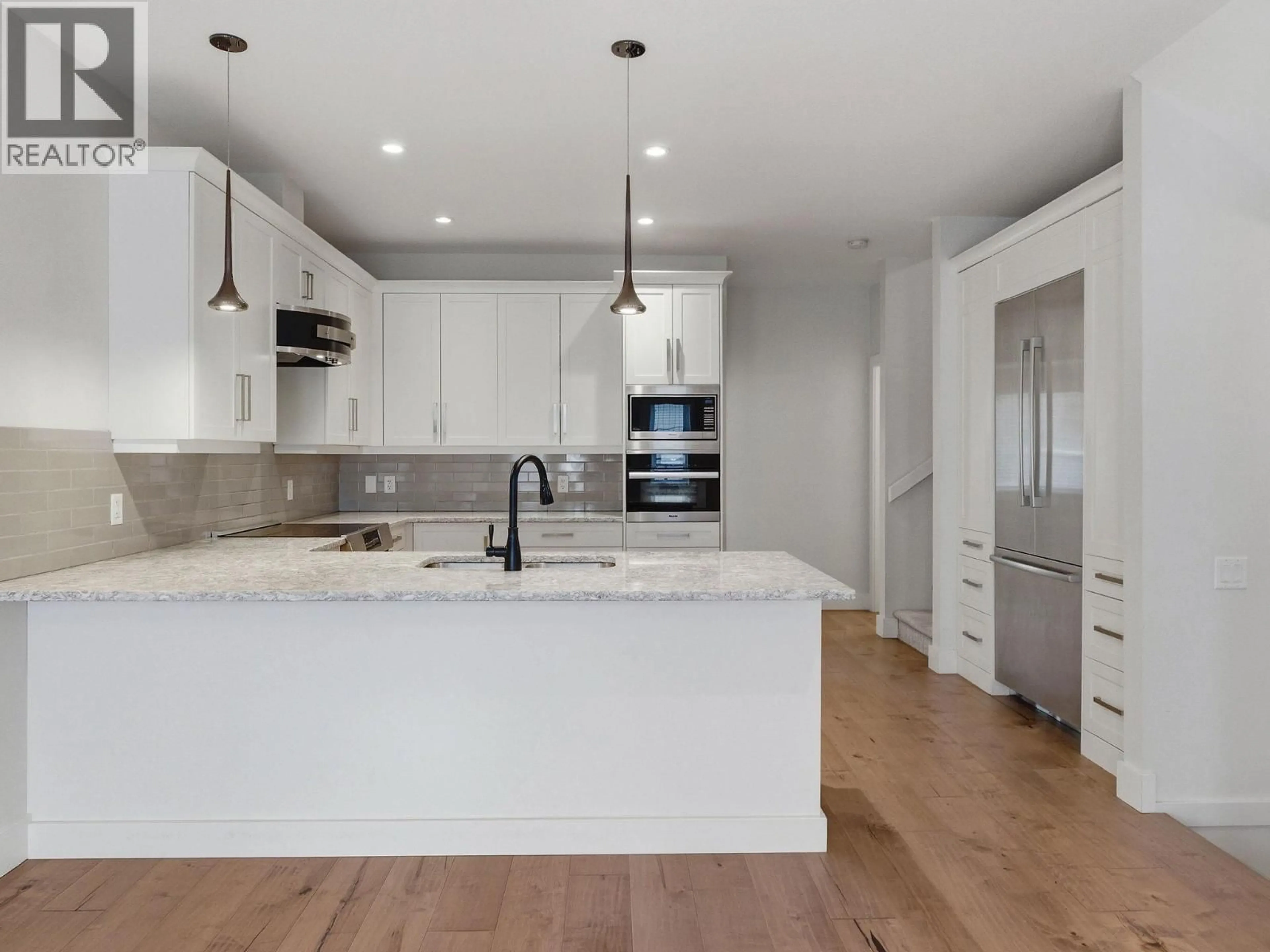 Open concept kitchen, unknown for 17 - 644 LEQUIME ROAD, Kelowna British Columbia V1W1A4