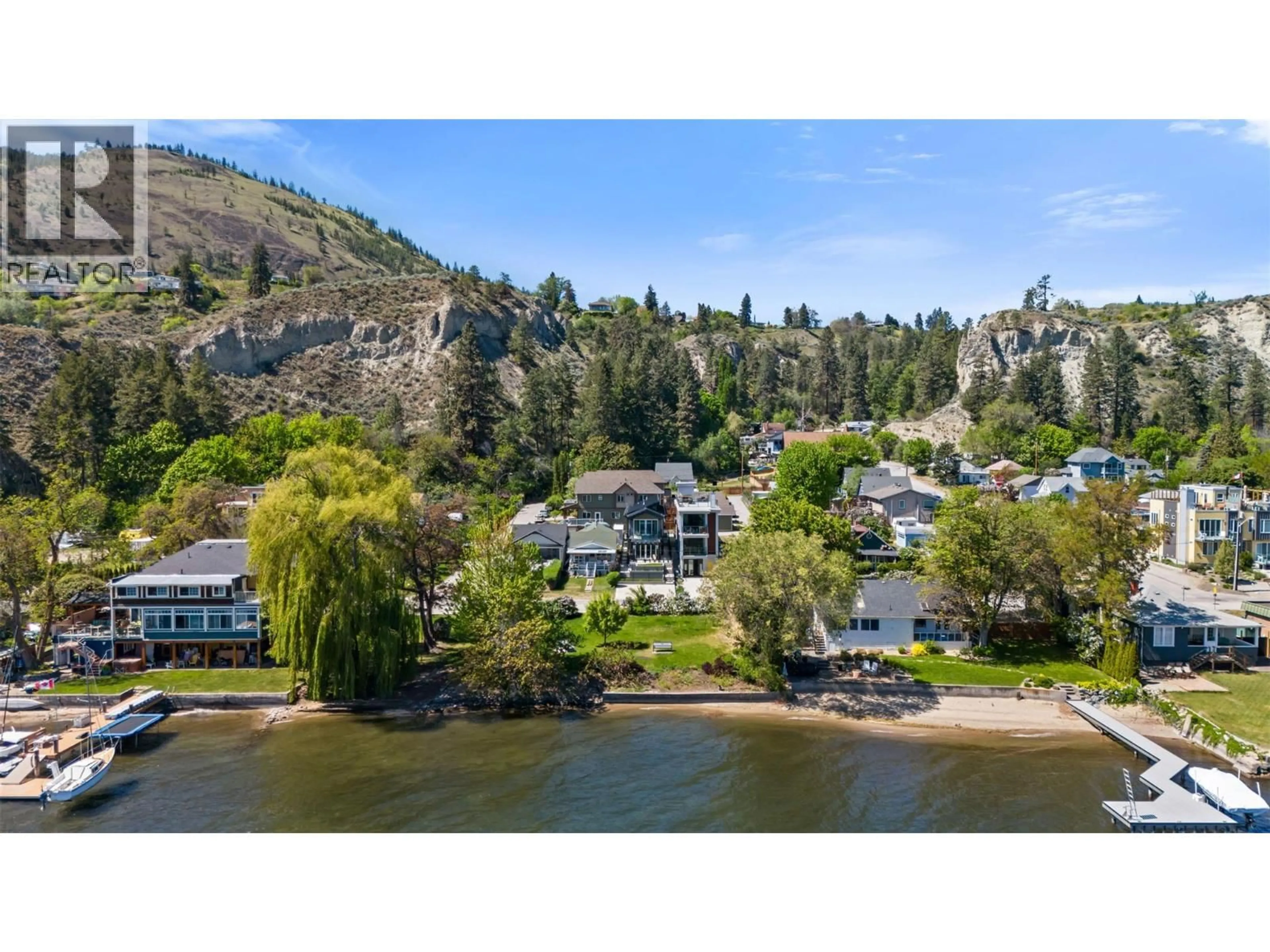 A pic from outside/outdoor area/front of a property/back of a property/a pic from drone, water/lake/river/ocean view for 12206 LAKESHORE DRIVE SOUTH, Summerland British Columbia V0H1Z1