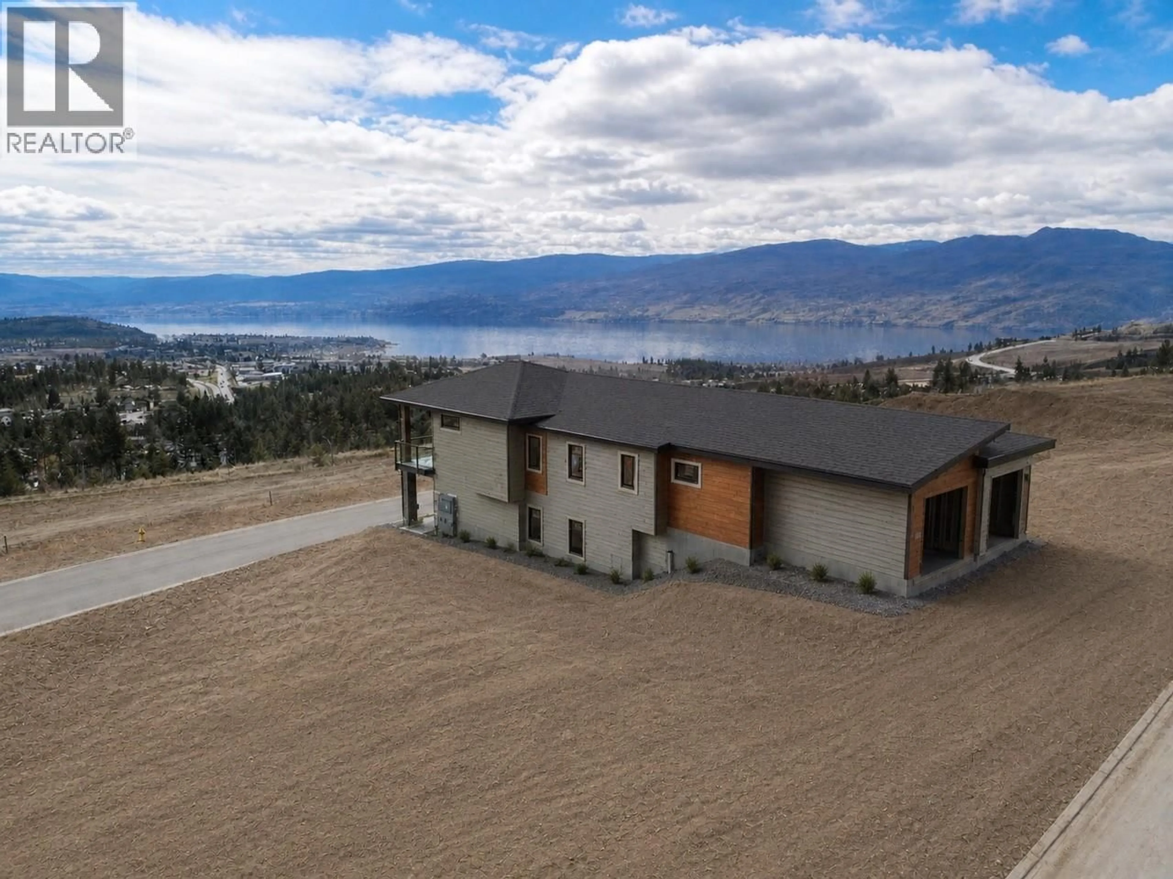 A pic from outside/outdoor area/front of a property/back of a property/a pic from drone, mountain view for 3746 MORNINGSIDE DRIVE, West Kelowna British Columbia V4T0B1
