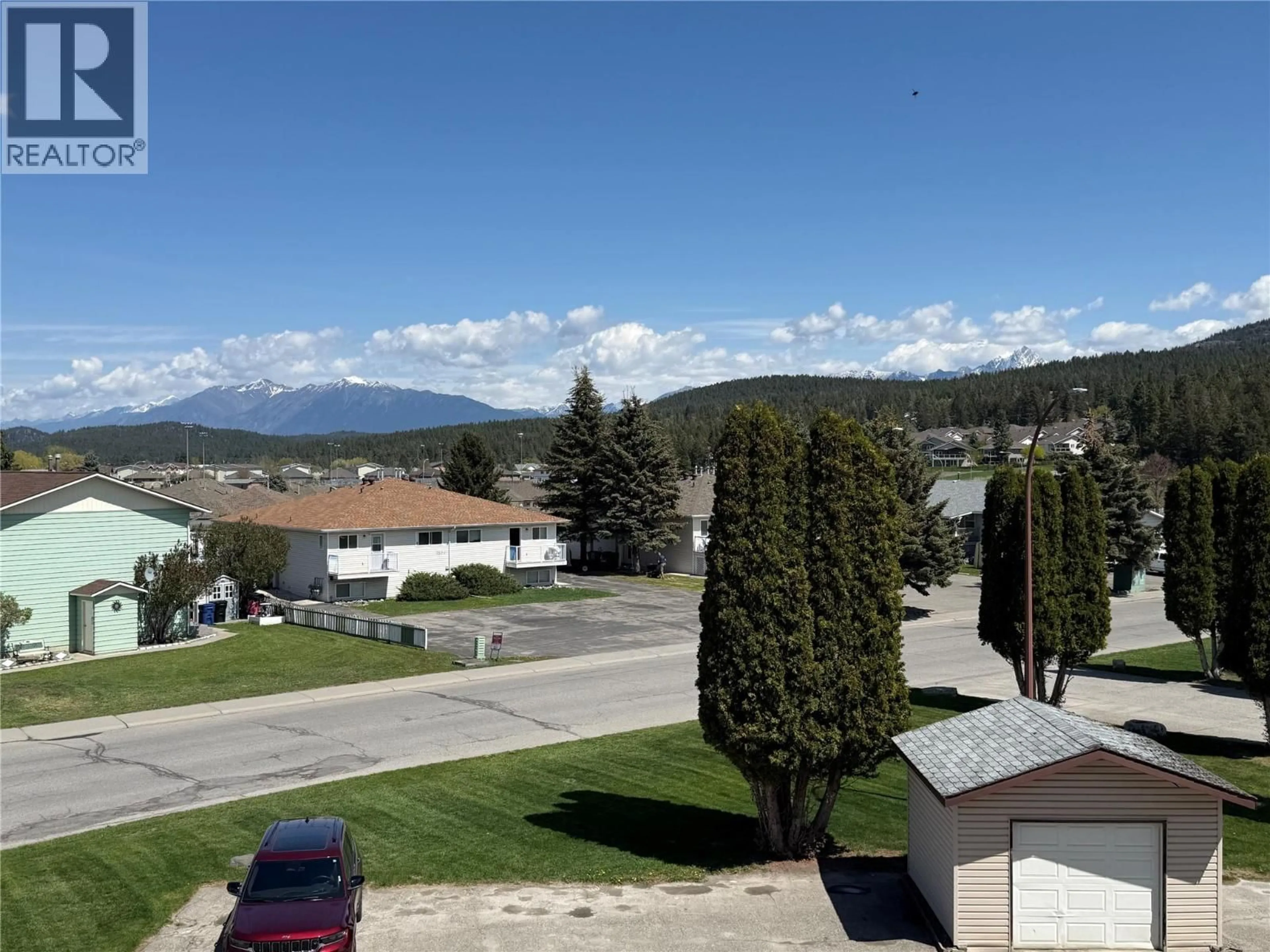 A pic from outside/outdoor area/front of a property/back of a property/a pic from drone, mountain view for 3007 - 2501 12TH STREET NORTH, Cranbrook British Columbia V1C5Y7