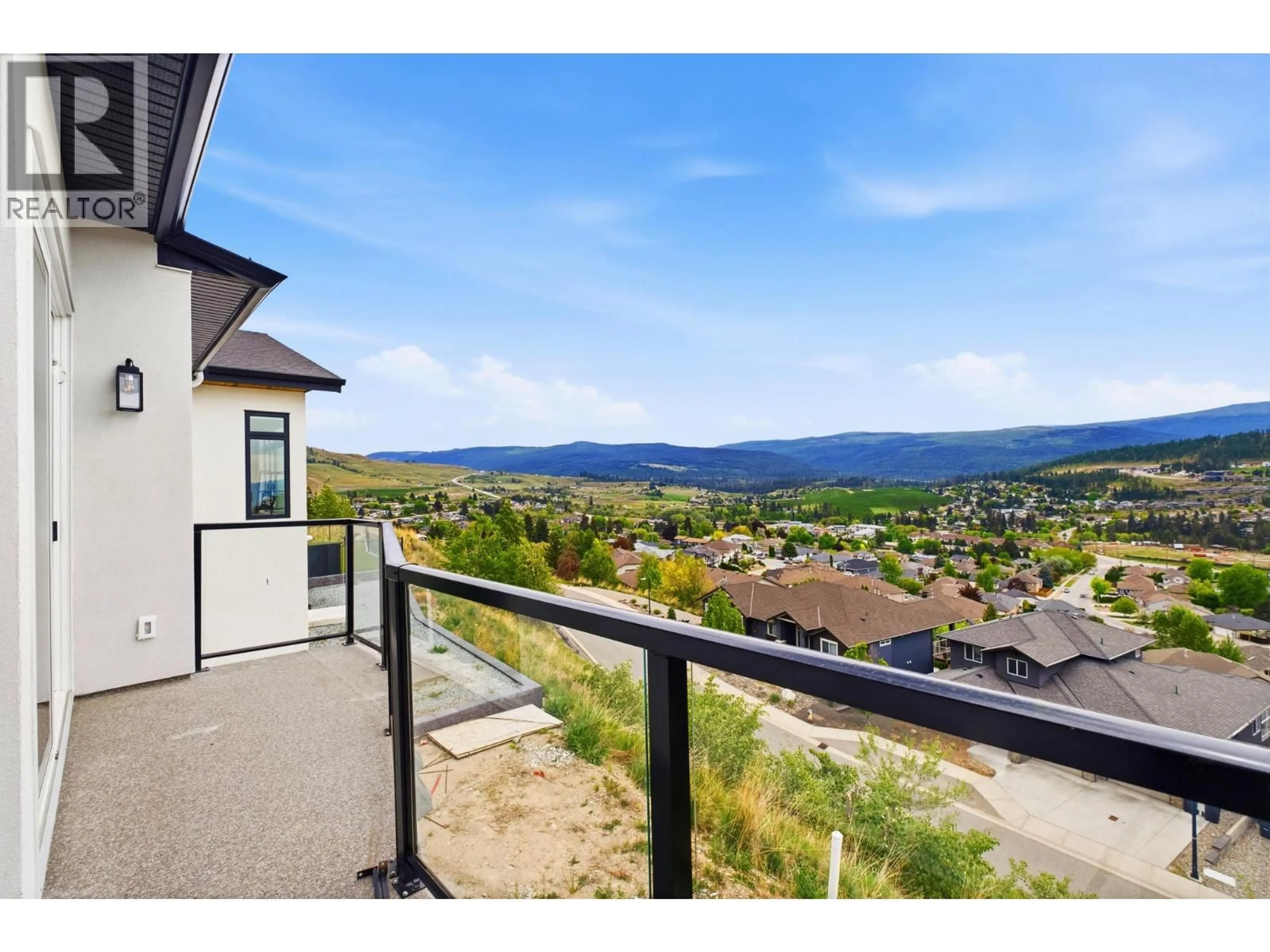 A pic from outside/outdoor area/front of a property/back of a property/a pic from drone, mountain view for 1531 FAIRWOOD LANE, Kelowna British Columbia V1P0A4