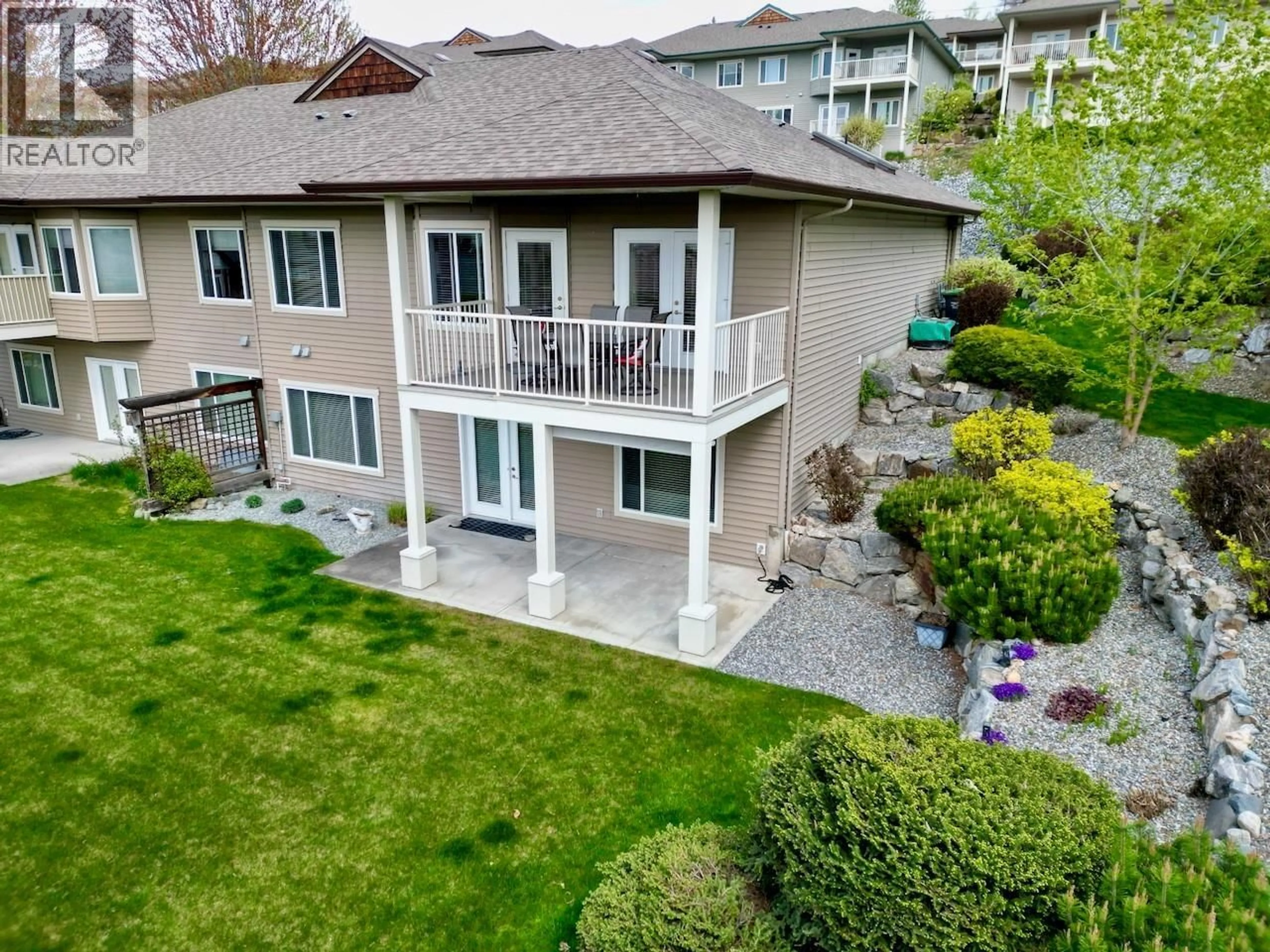 A pic from outside/outdoor area/front of a property/back of a property/a pic from drone, water/lake/river/ocean view for 2 - 820 MCKENZIE ROAD, Kelowna British Columbia V1X8B5