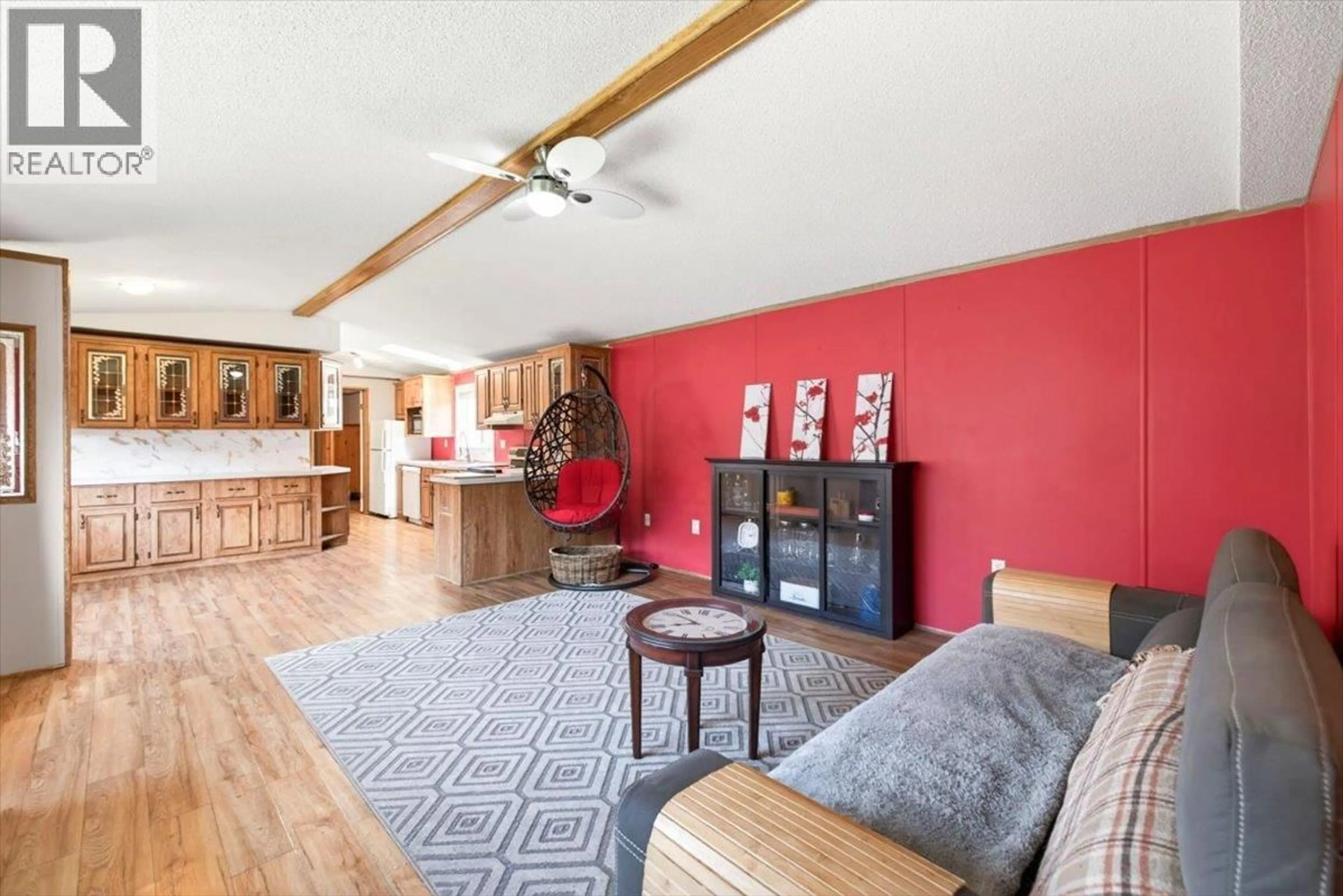 Living room with furniture, wood/laminate floor for 57 - 100 ASPEN DRIVE, Sparwood British Columbia V0B2G0