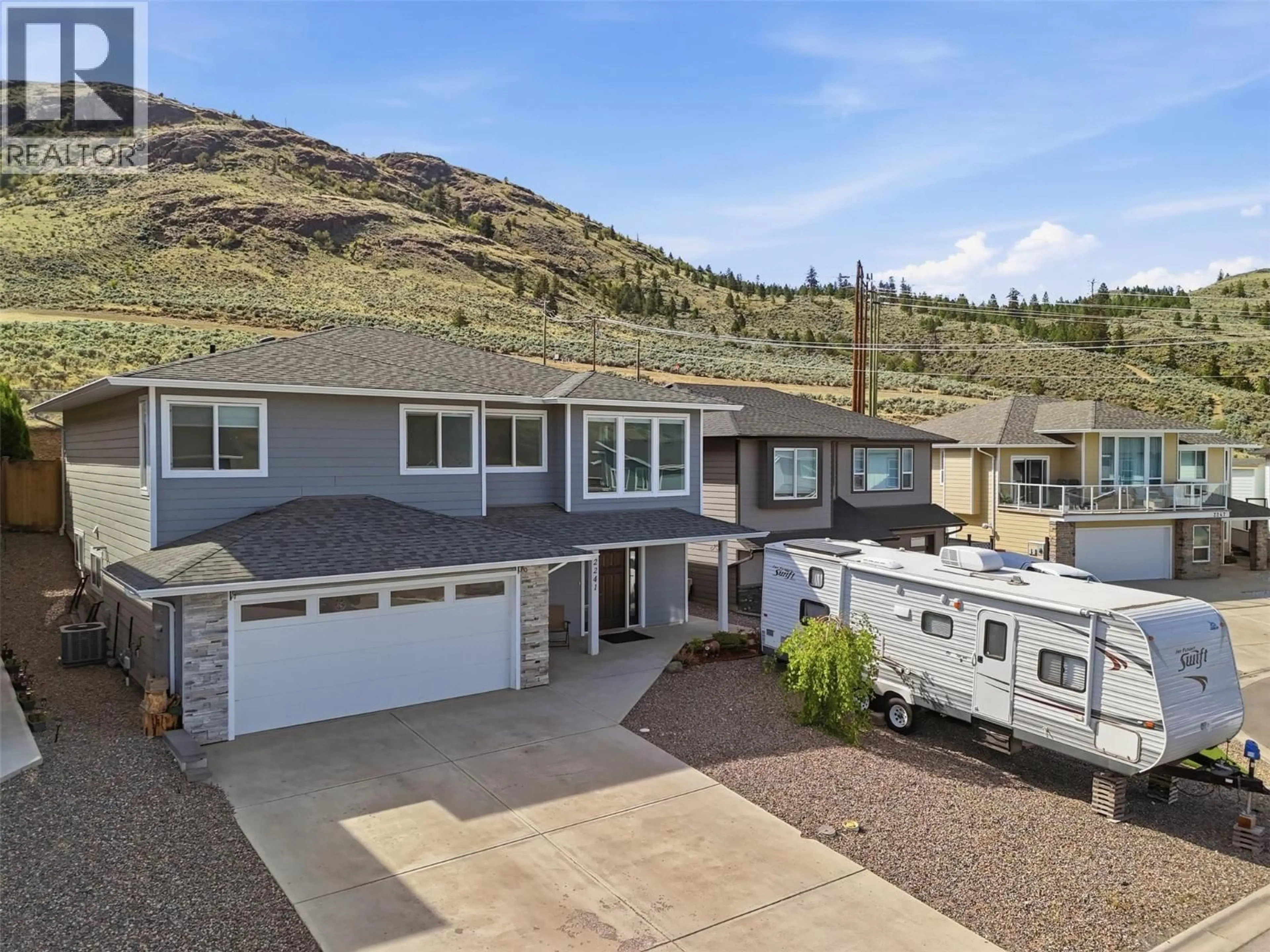 A pic from outside/outdoor area/front of a property/back of a property/a pic from drone, mountain view for 2241 SADDLEBACK DRIVE, Kamloops British Columbia V2B0G7