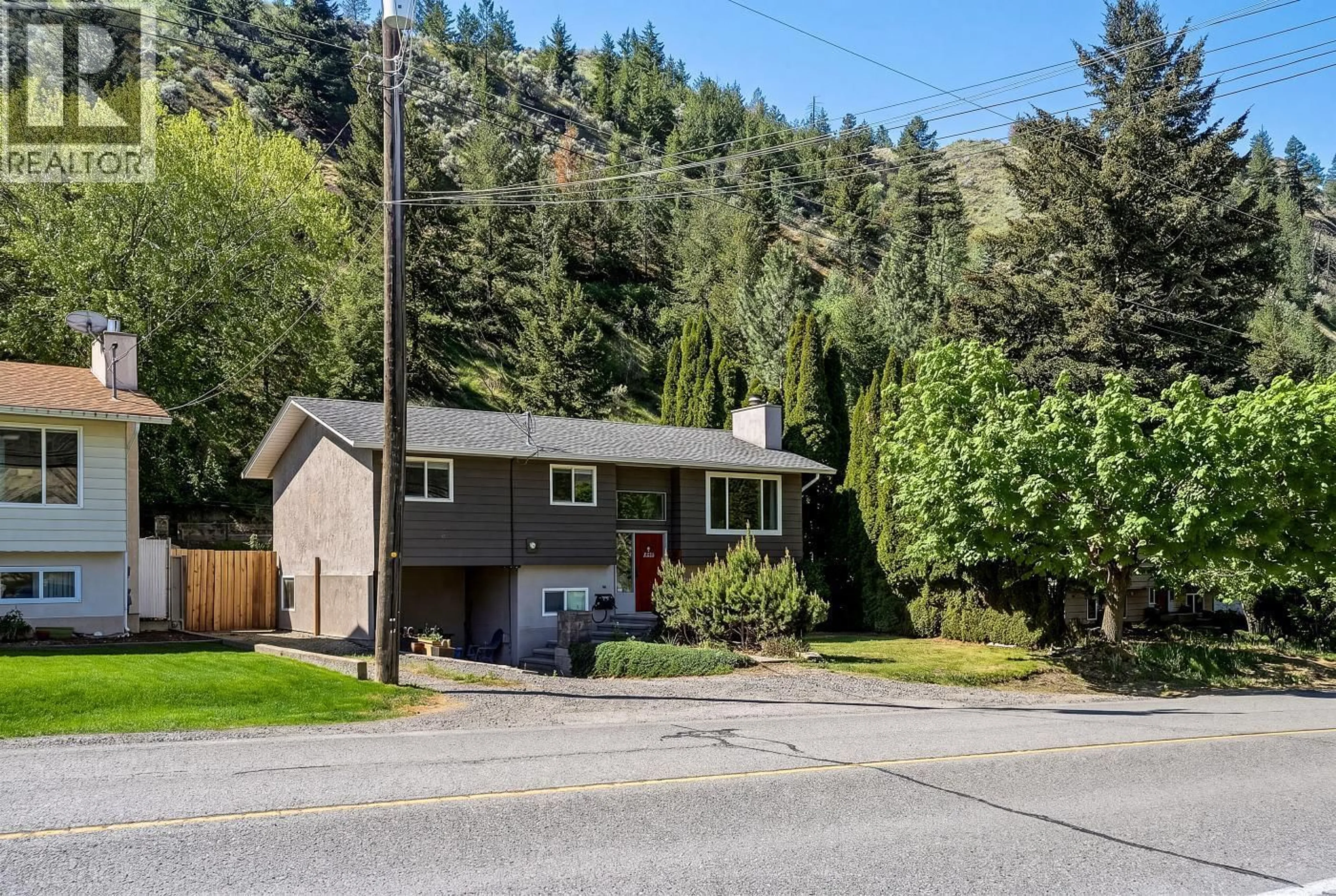 Home with vinyl exterior material, street for 6105 DALLAS DRIVE, Kamloops British Columbia V2C5Z9