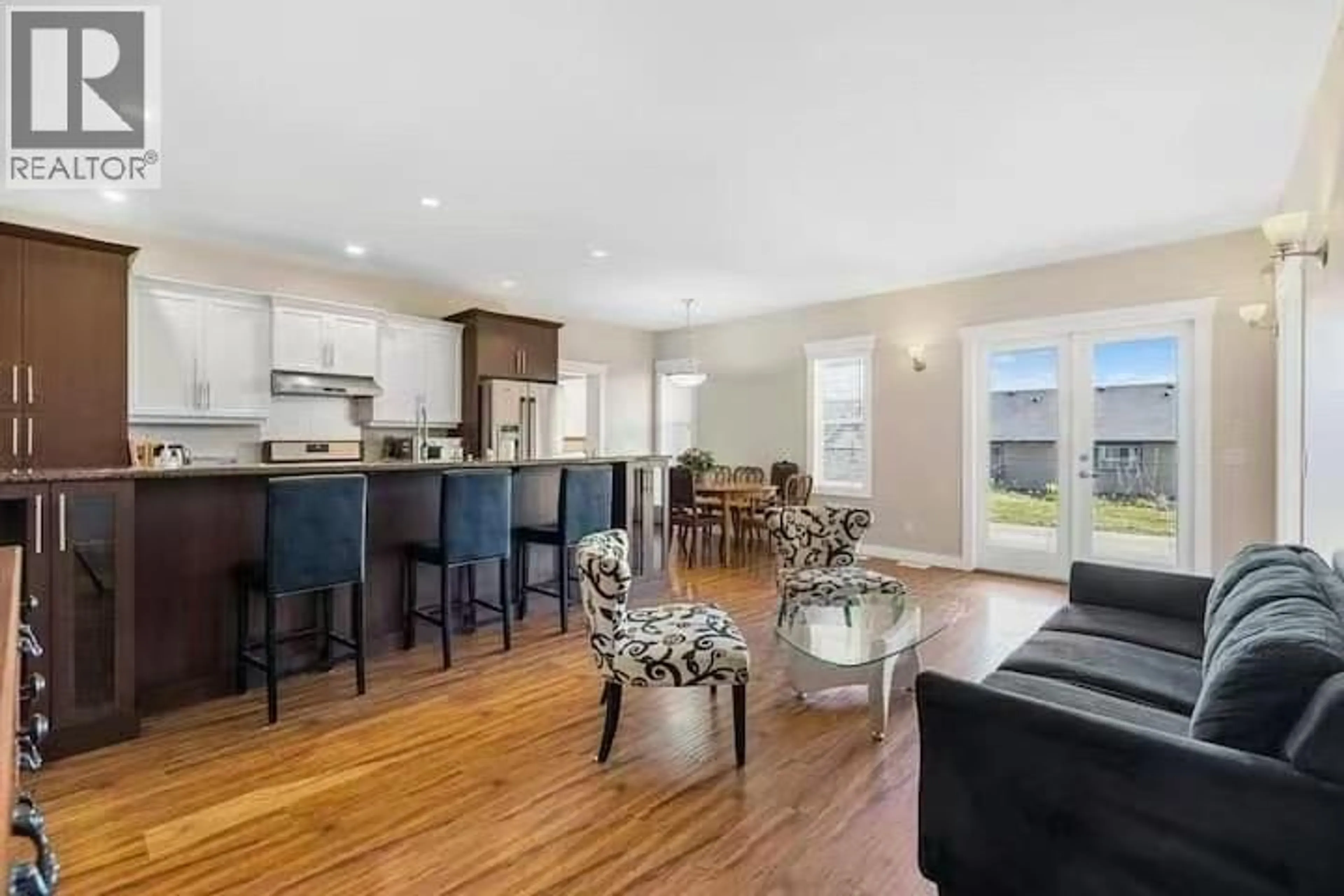 Open concept kitchen, wood/laminate floor for 337 ARAB ROAD, Kelowna British Columbia V1V3A8