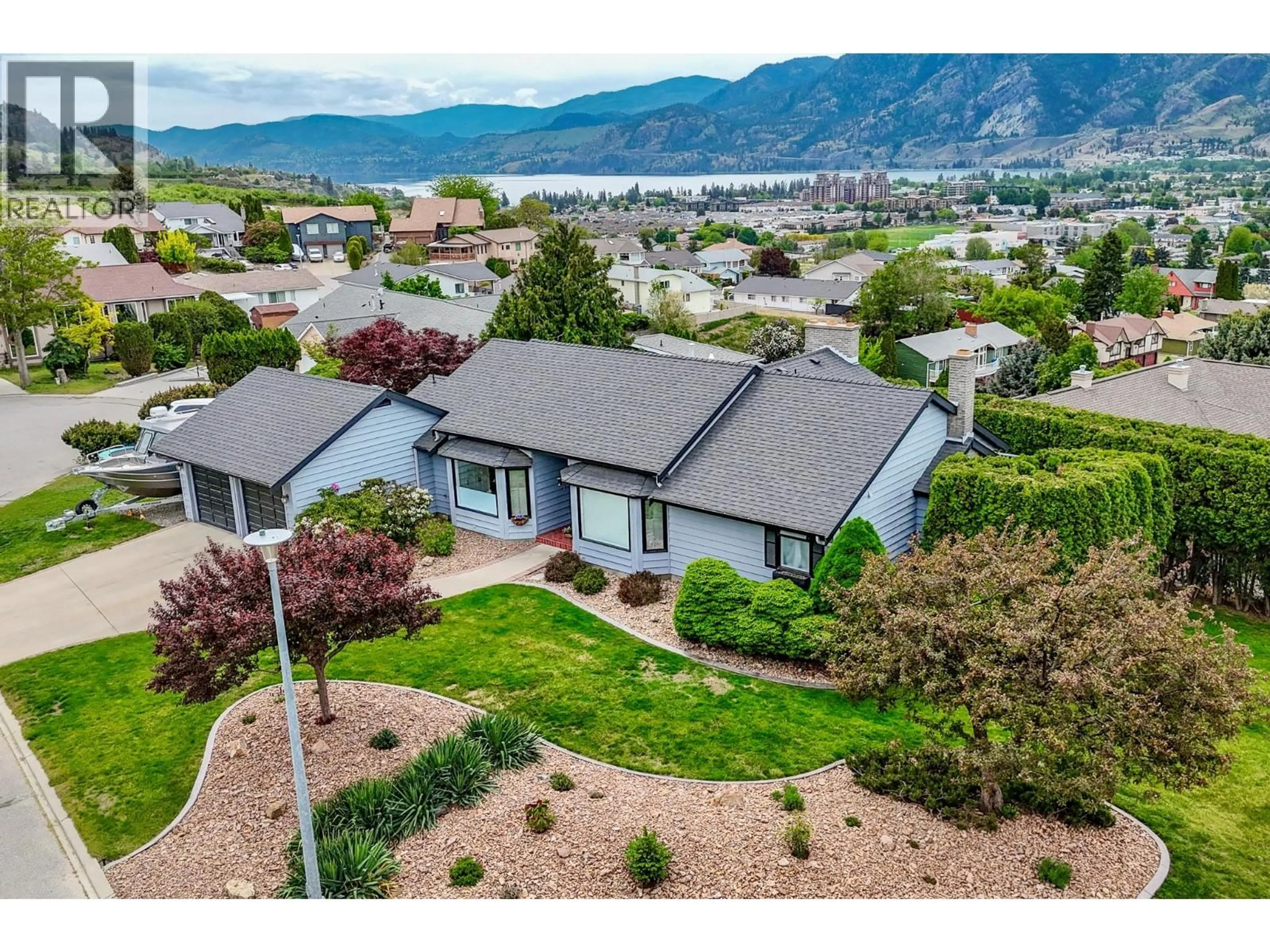 A pic from outside/outdoor area/front of a property/back of a property/a pic from drone, mountain view for 126 BRENTVIEW PLACE, Penticton British Columbia V2A8H2