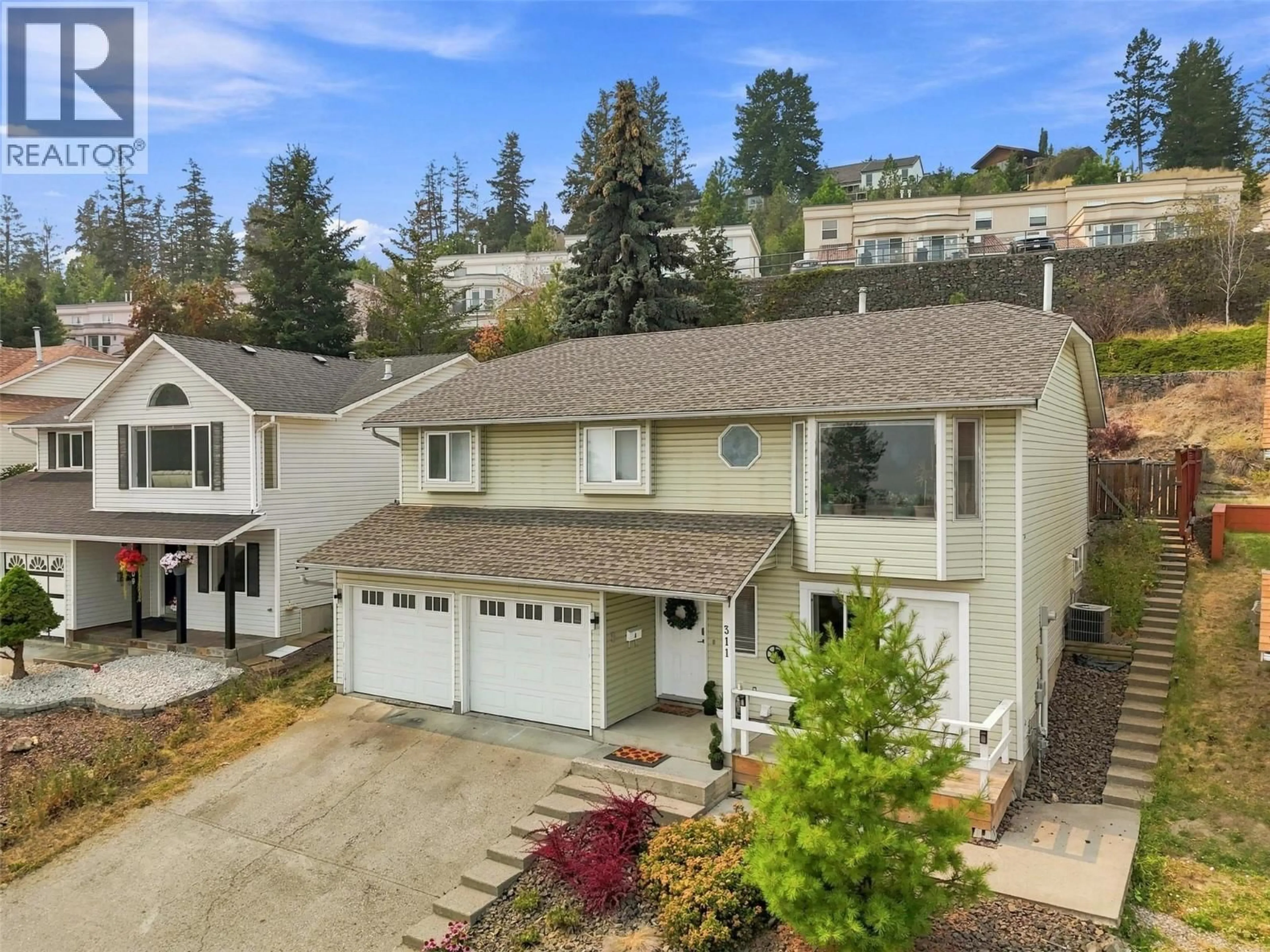 A pic from outside/outdoor area/front of a property/back of a property/a pic from drone, mountain view for 311 GLENEAGLES DRIVE, Kamloops British Columbia V2E1Z5