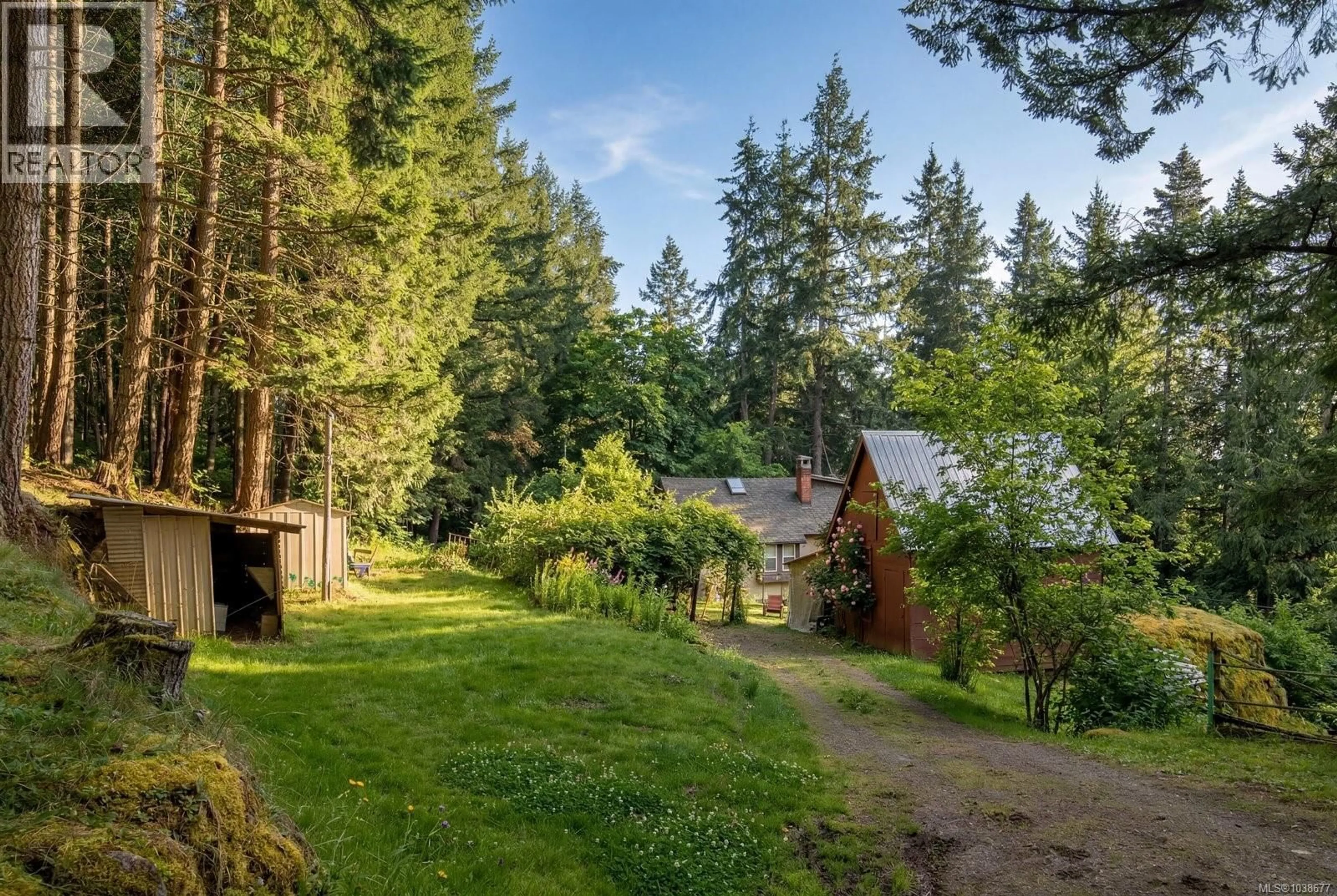 A pic from outside/outdoor area/front of a property/back of a property/a pic from drone, forest/trees view for 1183 HILLGROVE ROAD, North Saanich British Columbia V8L5R8