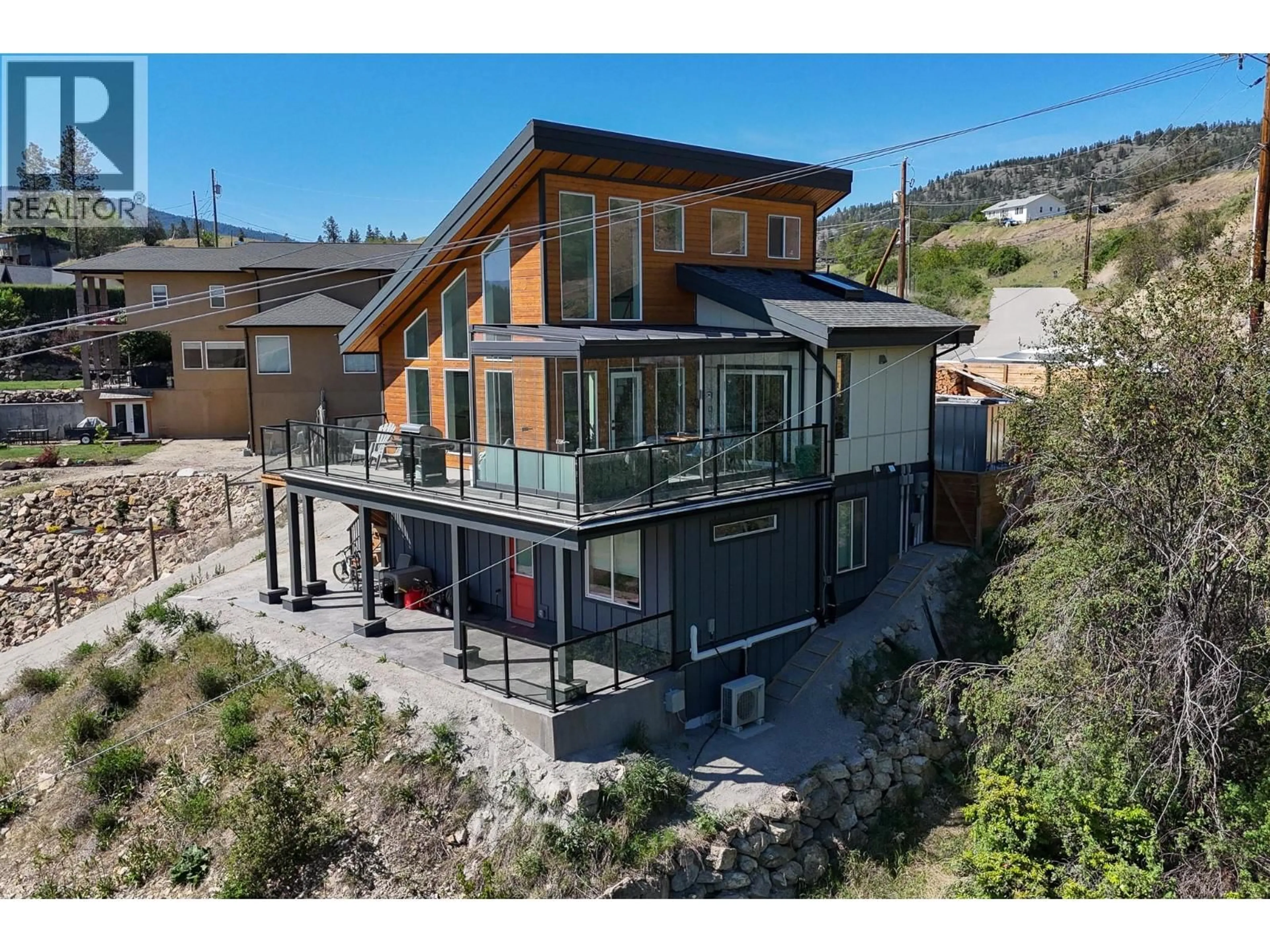 A pic from outside/outdoor area/front of a property/back of a property/a pic from drone, unknown for 9003 GILMAN ROAD, Summerland British Columbia V0H1Z2