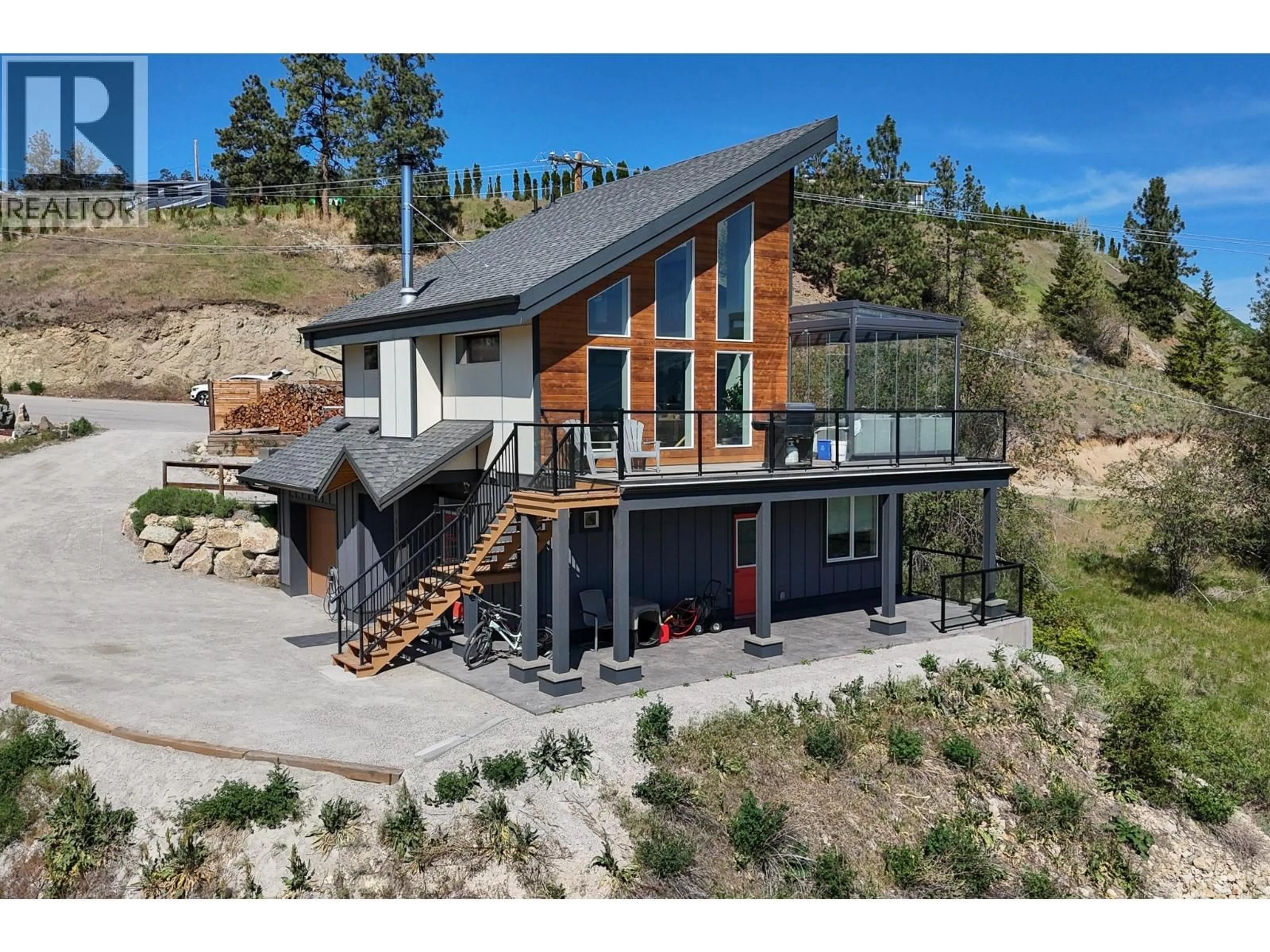 A pic from outside/outdoor area/front of a property/back of a property/a pic from drone, mountain view for 9003 GILMAN ROAD, Summerland British Columbia V0H1Z2