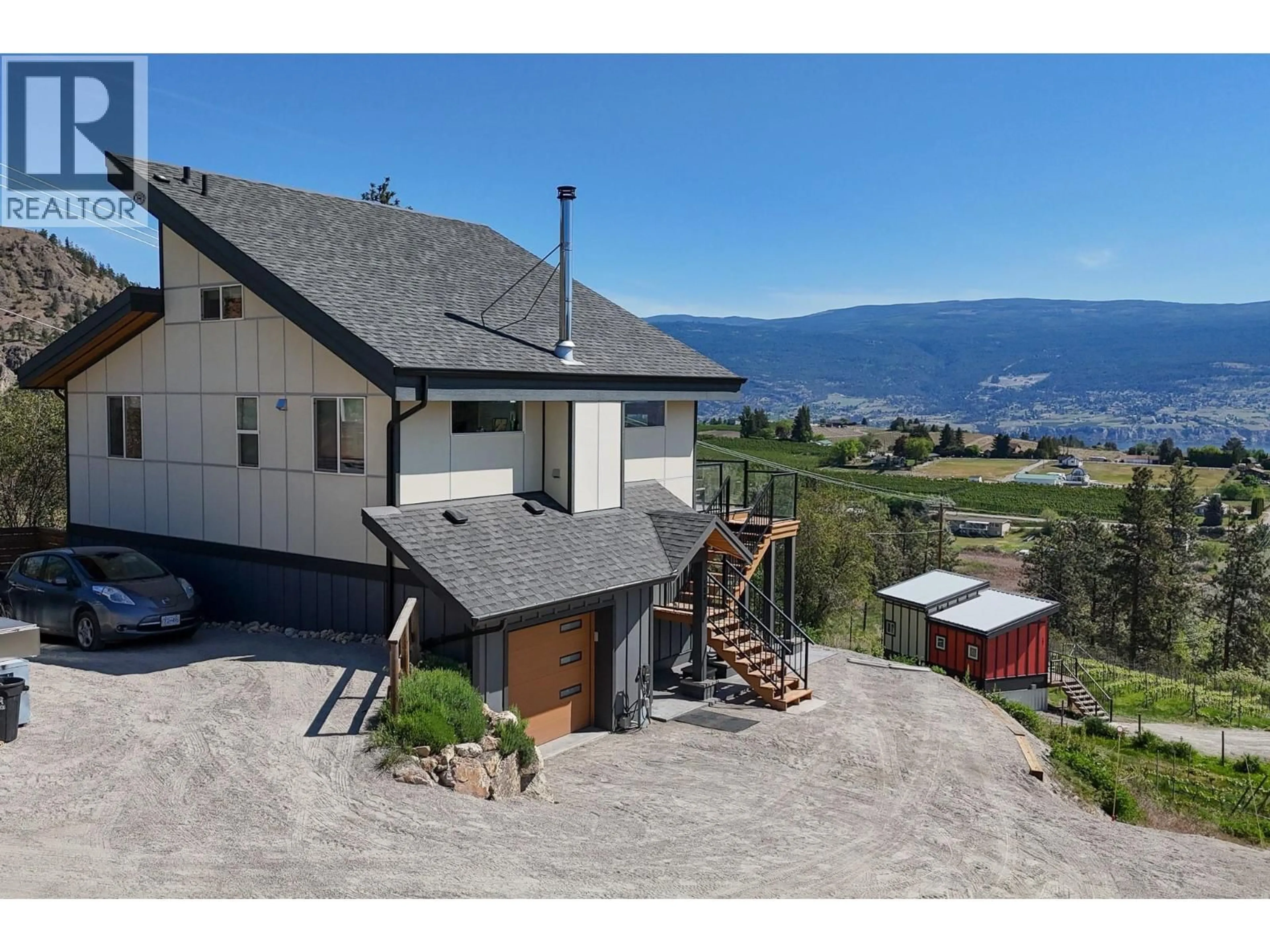 A pic from outside/outdoor area/front of a property/back of a property/a pic from drone, mountain view for 9003 GILMAN ROAD, Summerland British Columbia V0H1Z2