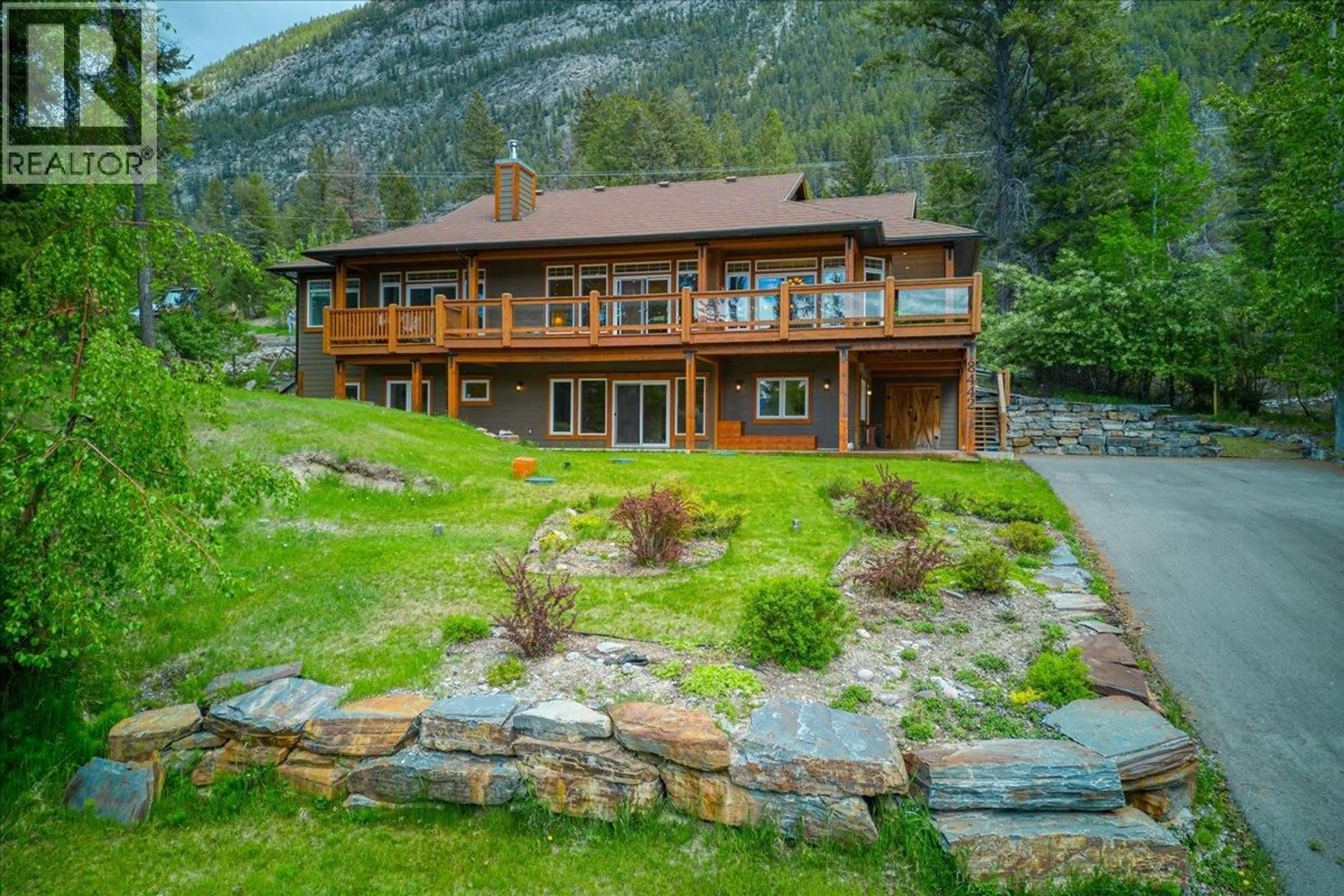 A pic from outside/outdoor area/front of a property/back of a property/a pic from drone, water/lake/river/ocean view for 8442 RICHARDSON CRESCENT, Canal Flats British Columbia V0B1B0