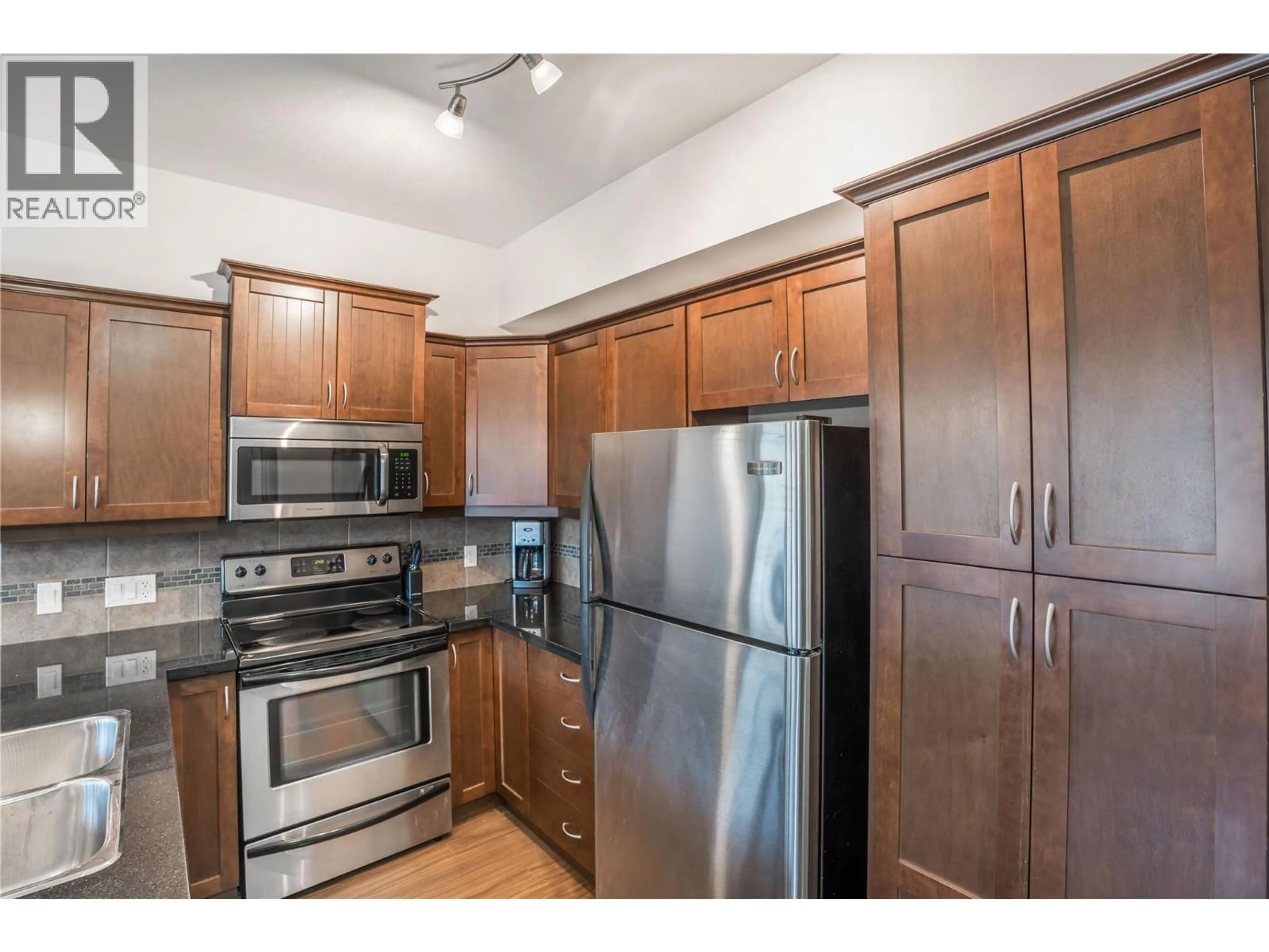 Standard kitchen, wood/laminate floor for 213 - 3533 CARRINGTON ROAD, West Kelowna British Columbia V4T2Z9