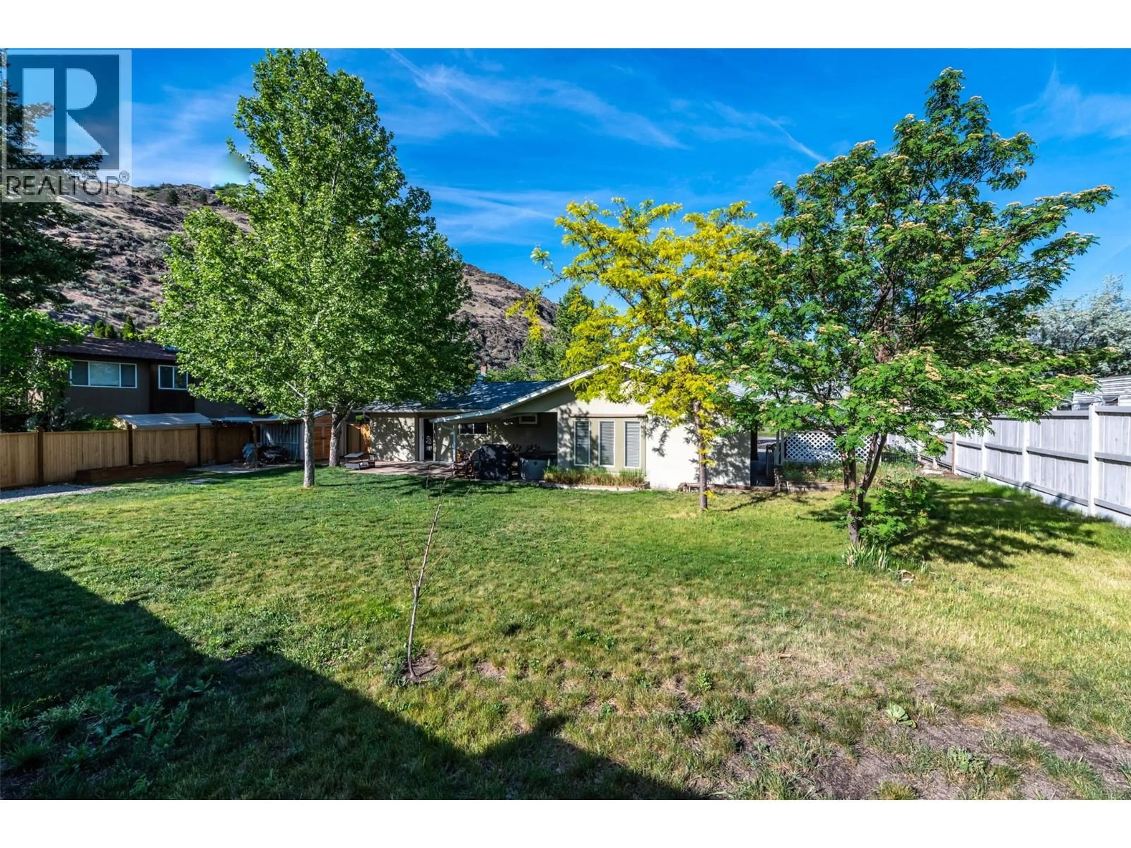 A pic from outside/outdoor area/front of a property/back of a property/a pic from drone, mountain view for 1080 MORNINGSTAR ROAD, Oliver British Columbia V0H1T6