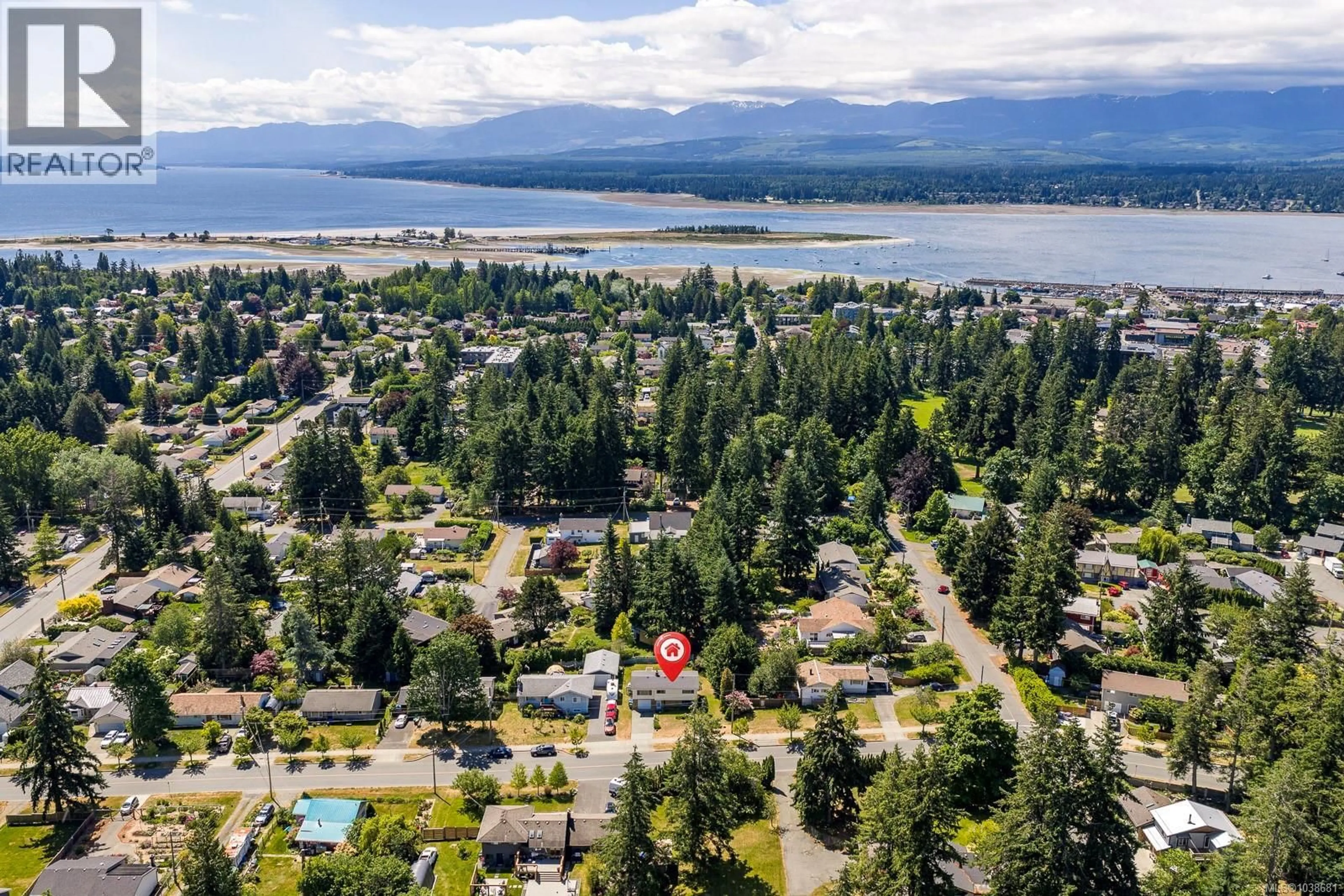 A pic from outside/outdoor area/front of a property/back of a property/a pic from drone, water/lake/river/ocean view for 1617 ROBB AVENUE, Comox British Columbia V9M2Y3