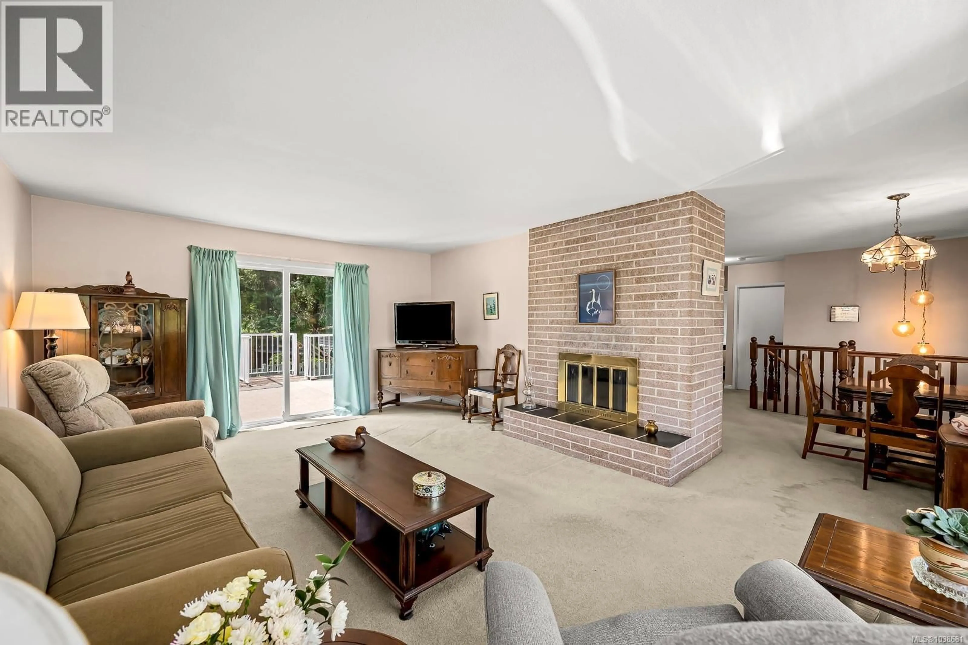 Living room with furniture, ceramic/tile floor for 1617 ROBB AVENUE, Comox British Columbia V9M2Y3