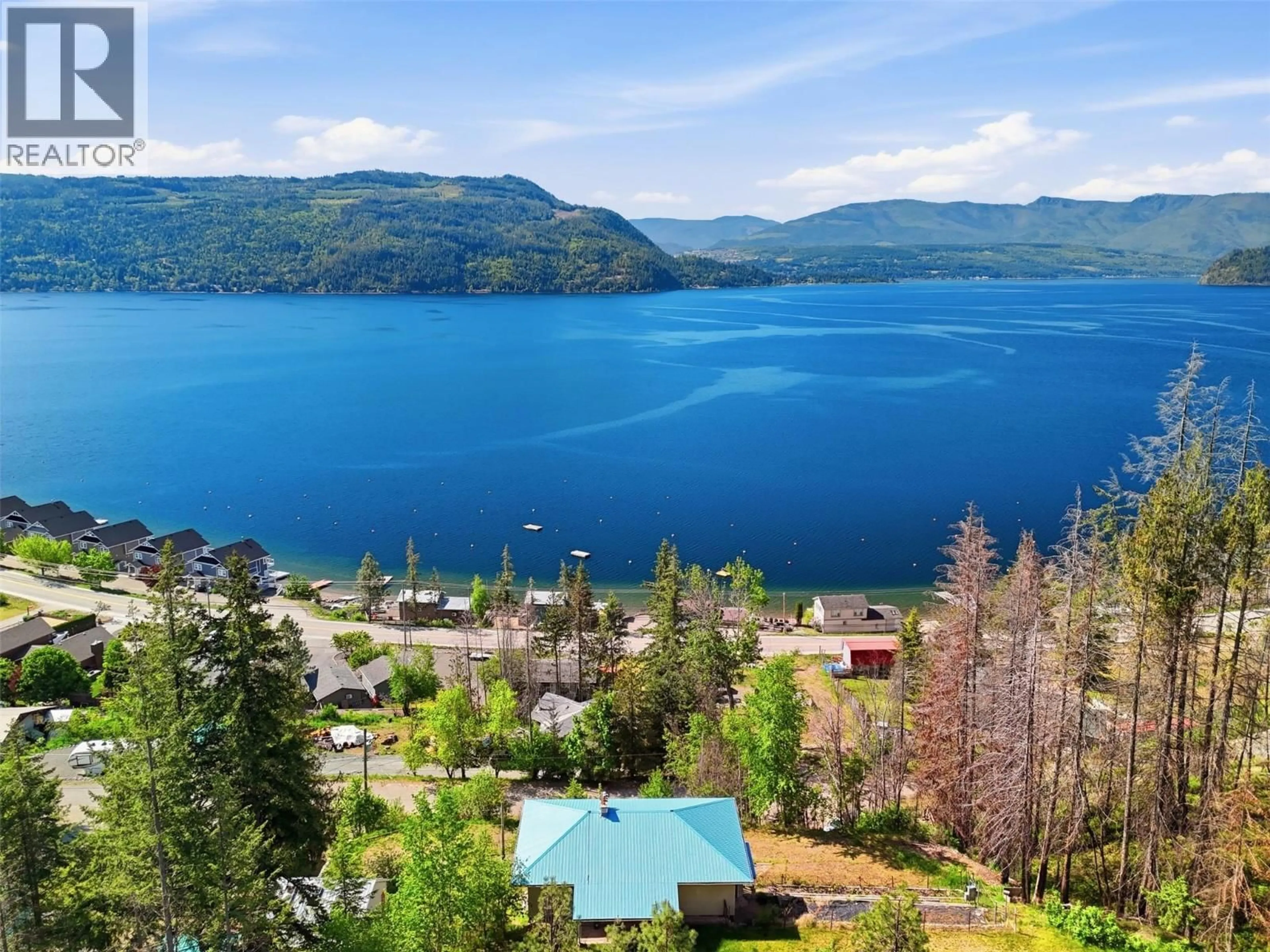 A pic from outside/outdoor area/front of a property/back of a property/a pic from drone, water/lake/river/ocean view for 5245 CHASEY ROAD, Celista British Columbia V0E1M6
