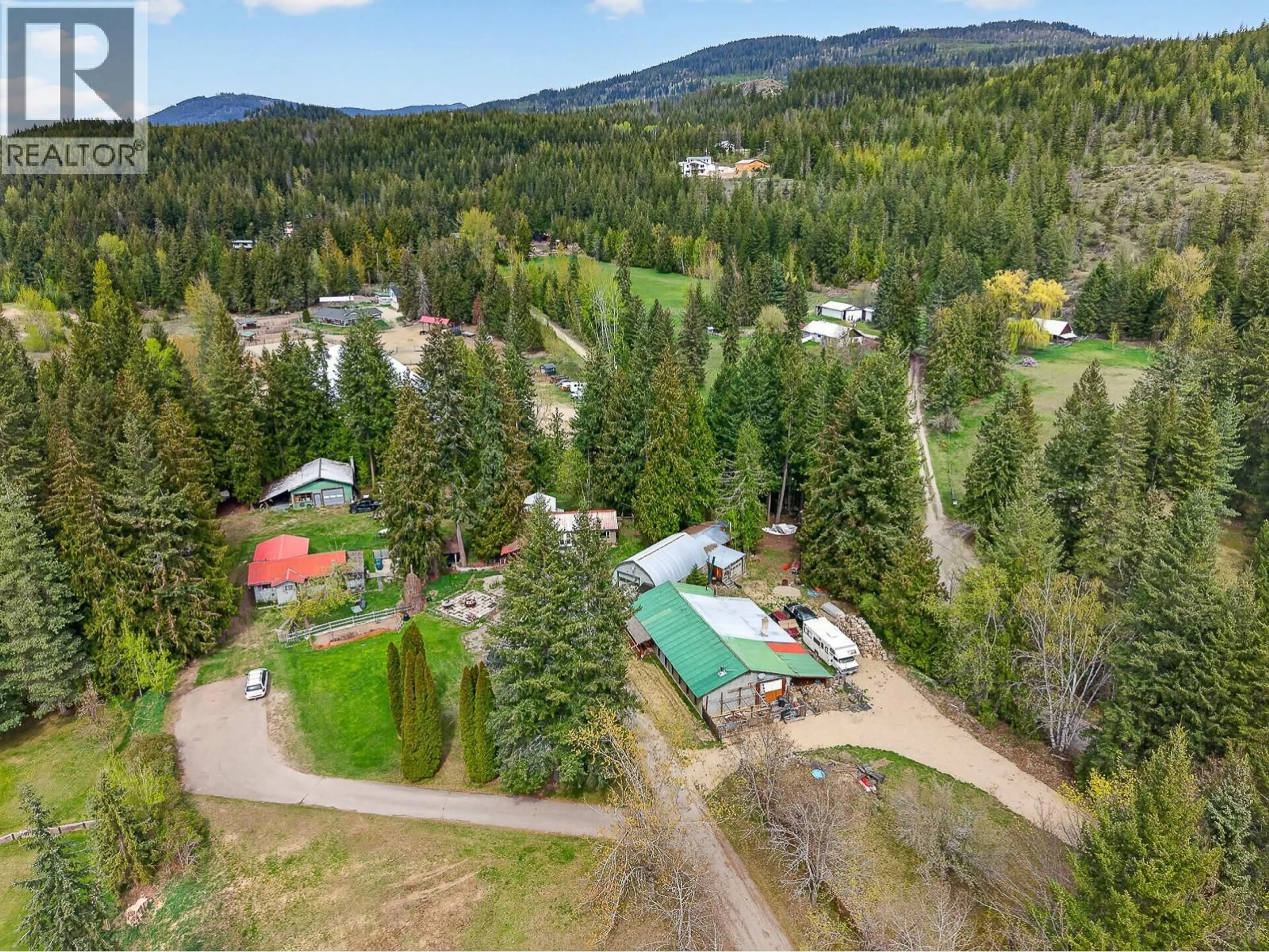 A pic from outside/outdoor area/front of a property/back of a property/a pic from drone, forest/trees view for 7909/7913 HUDSON ROAD, Salmon Arm British Columbia V1E2P9
