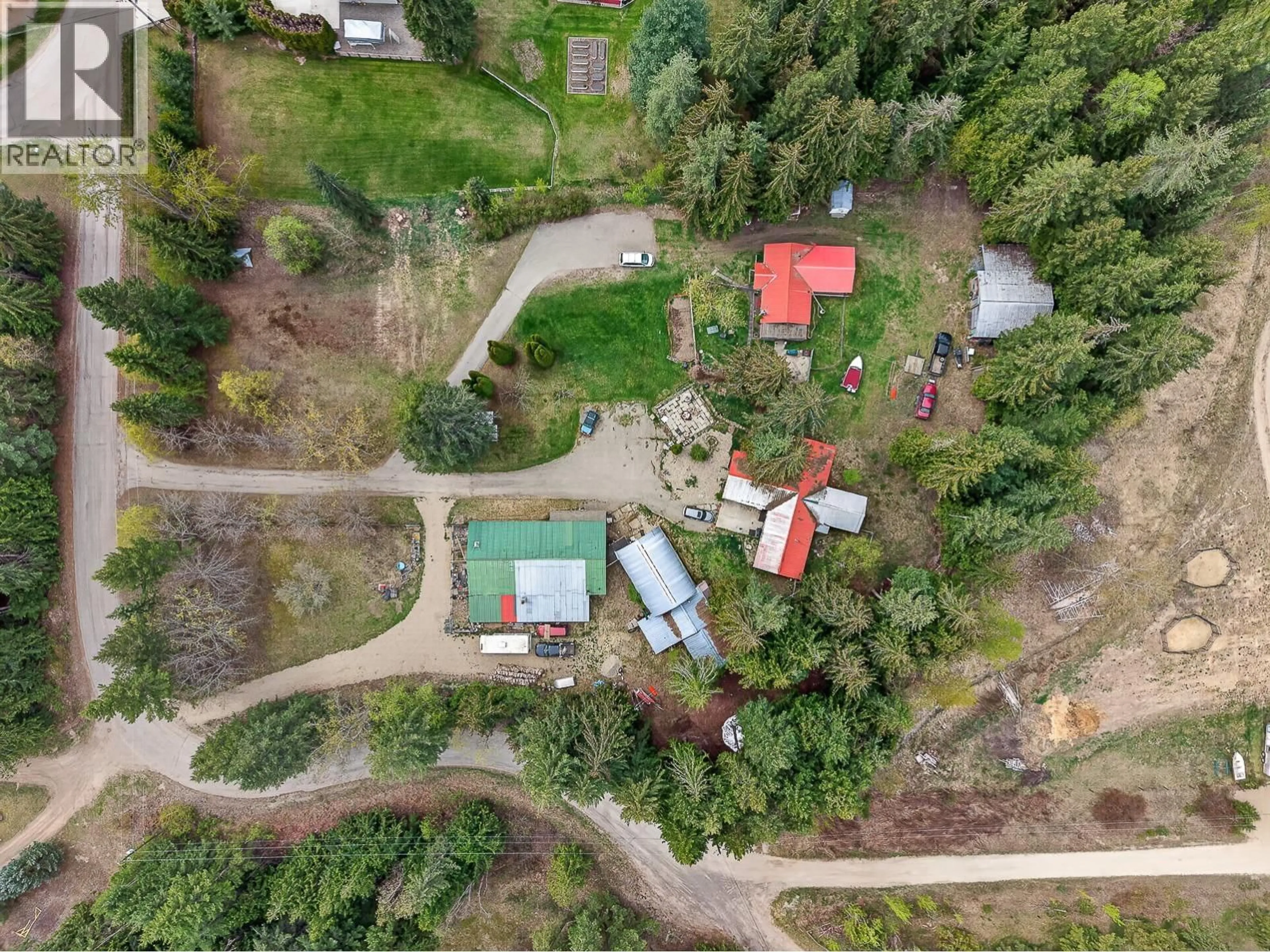 A pic from outside/outdoor area/front of a property/back of a property/a pic from drone, forest/trees view for 7909/7913 HUDSON ROAD, Salmon Arm British Columbia V1E2P9