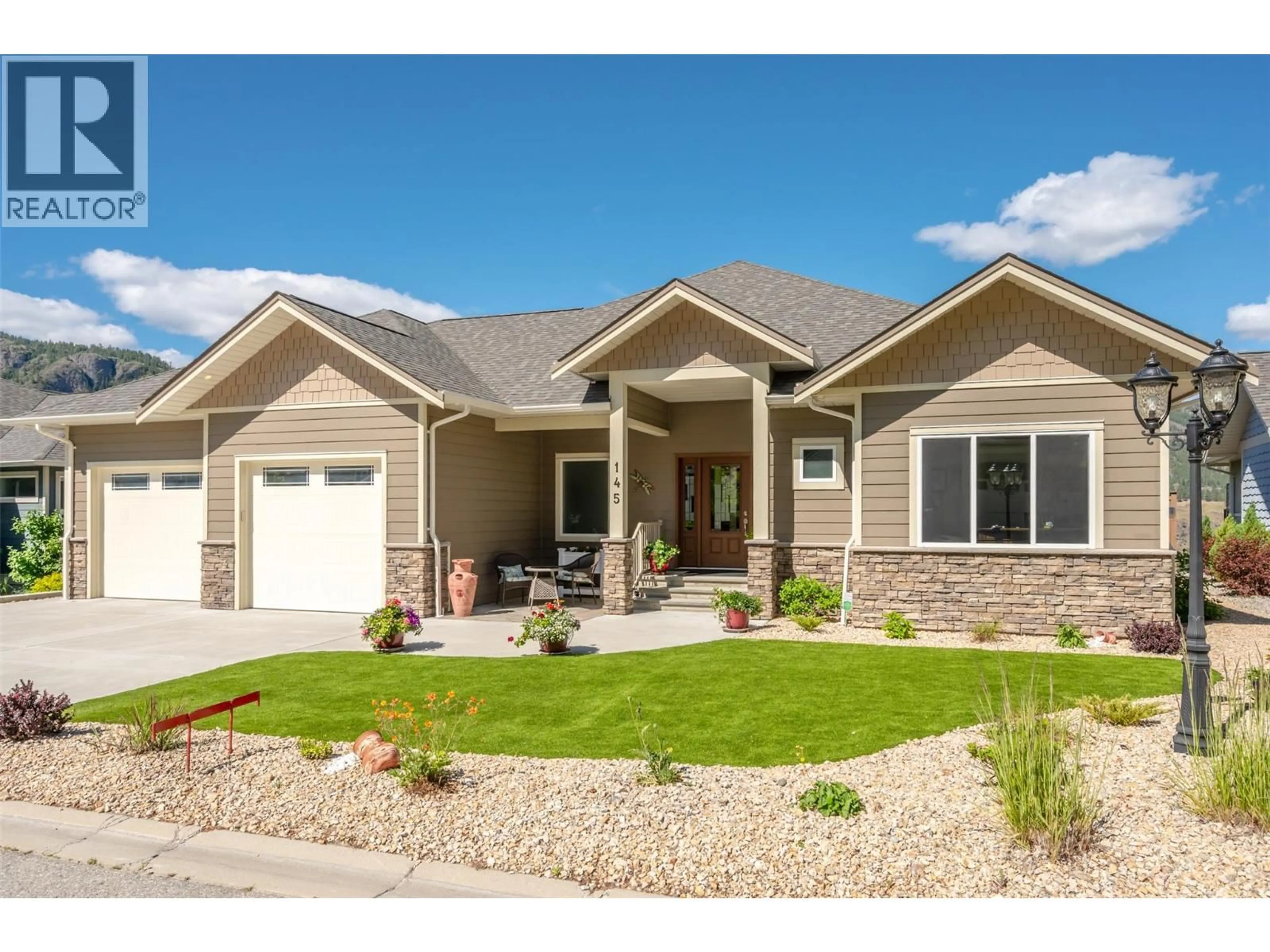 Home with vinyl exterior material, street for 145 - 4400 MCLEAN CREEK ROAD, Okanagan Falls British Columbia V0H1R6