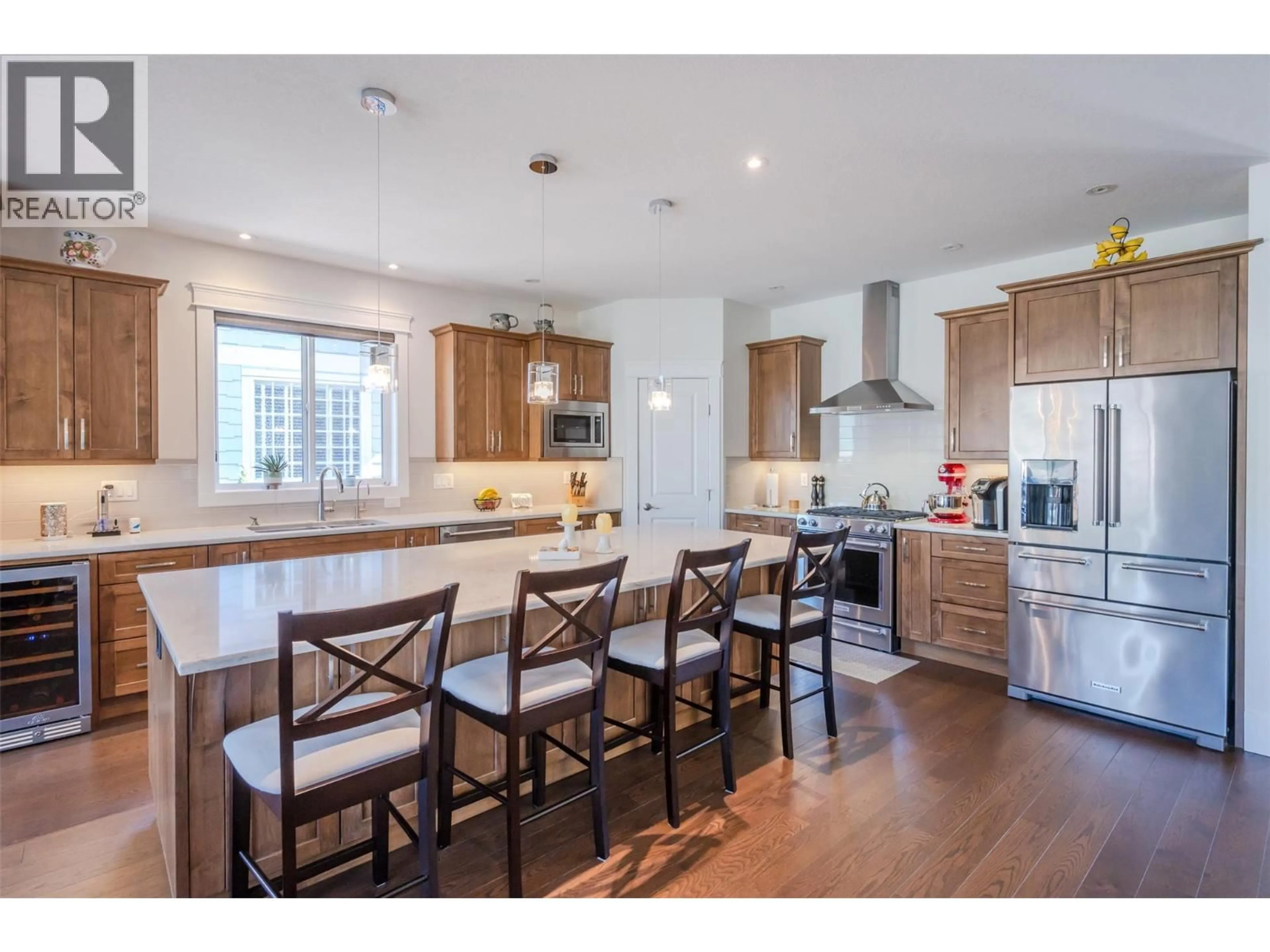 Open concept kitchen, wood/laminate floor for 145 - 4400 MCLEAN CREEK ROAD, Okanagan Falls British Columbia V0H1R6