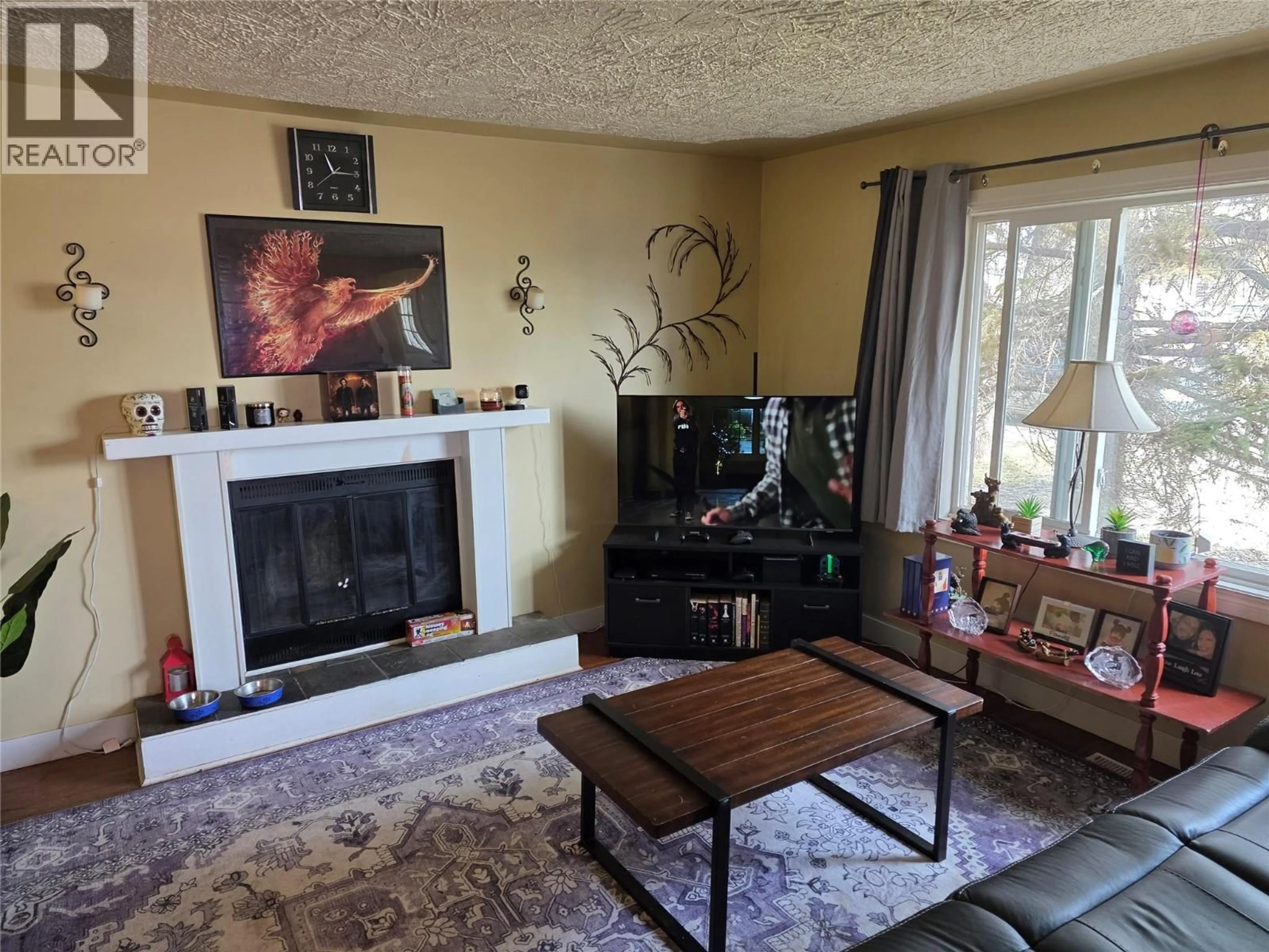 Living room with furniture, unknown for 1225 104 AVENUE, Dawson Creek British Columbia V1G2J4