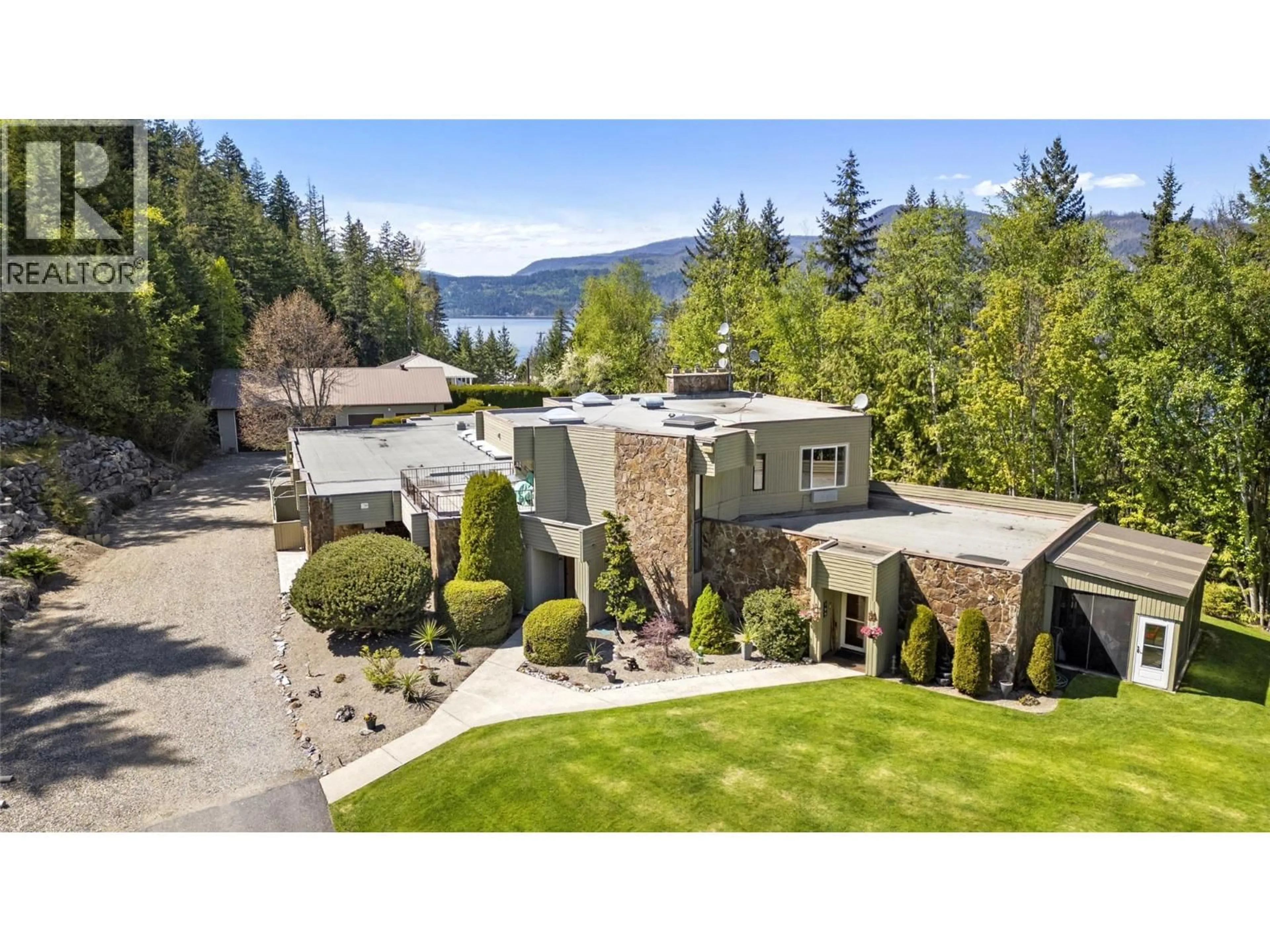 A pic from outside/outdoor area/front of a property/back of a property/a pic from drone, water/lake/river/ocean view for 1 to 5 - 2924 EAGLE BAY ROAD, Blind Bay British Columbia V0E1H1