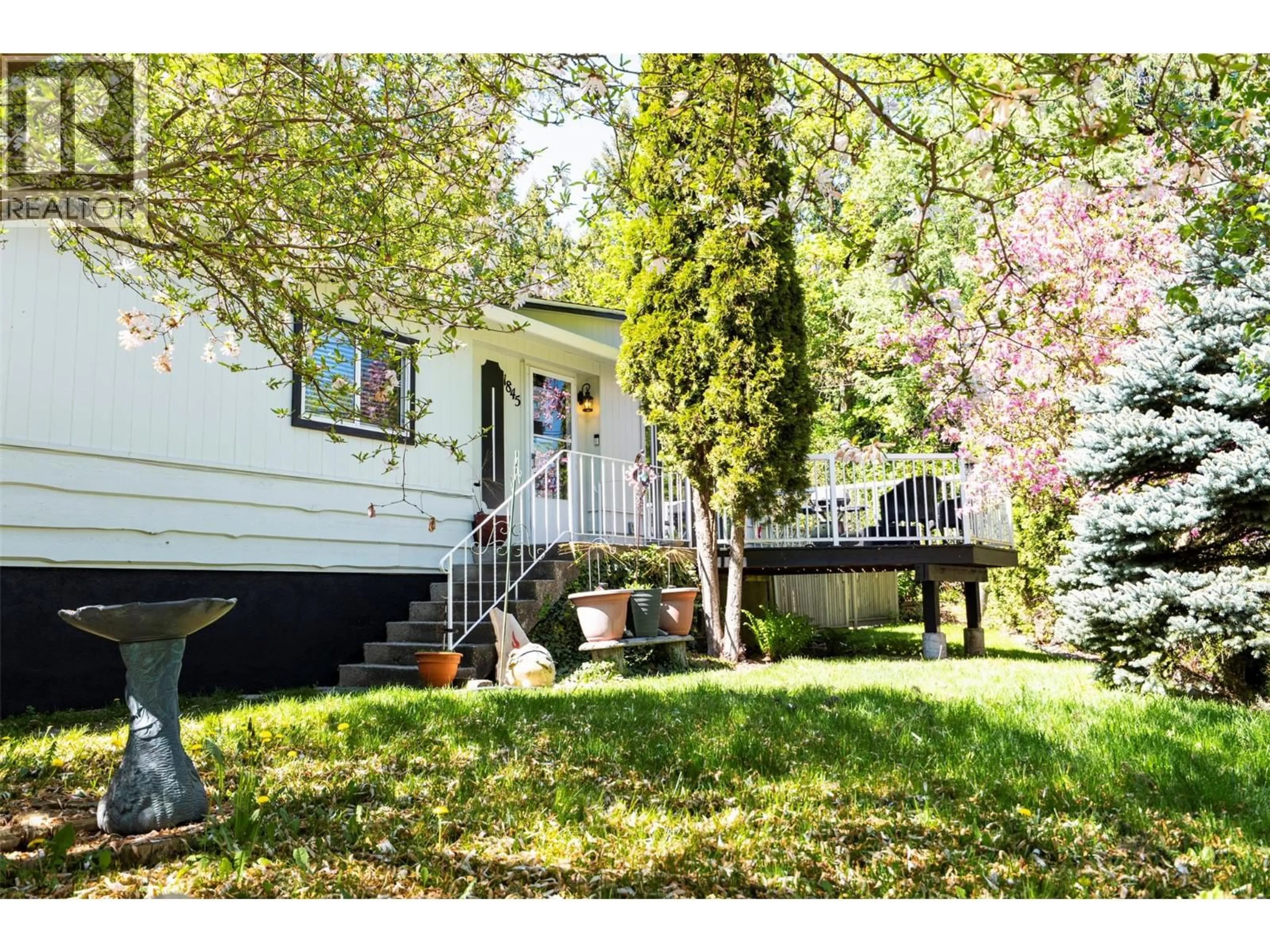 Home with vinyl exterior material, street for 1845 RIDGEWOOD ROAD, Nelson British Columbia V1L6J9