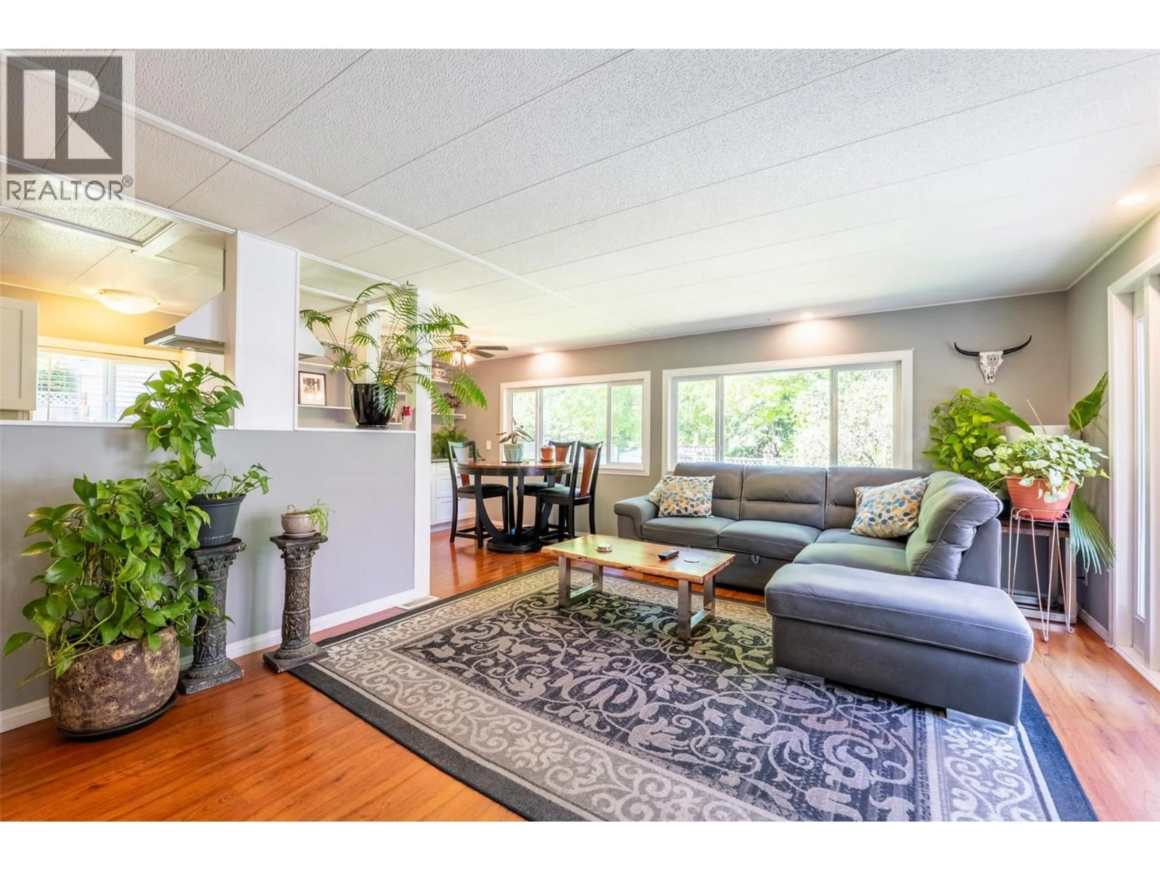 Living room with furniture, wood/laminate floor for 1845 RIDGEWOOD ROAD, Nelson British Columbia V1L6J9