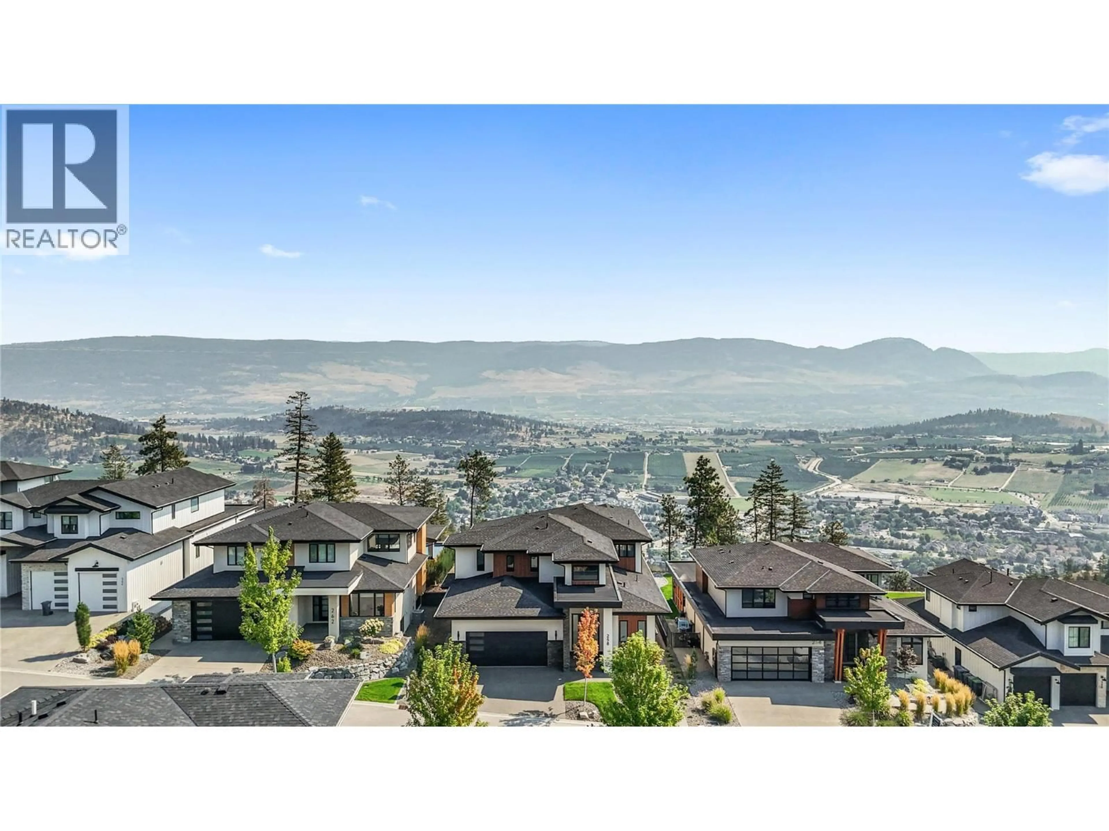 A pic from outside/outdoor area/front of a property/back of a property/a pic from drone, mountain view for 258 SUMMER WOOD DRIVE, Kelowna British Columbia V1V0C9