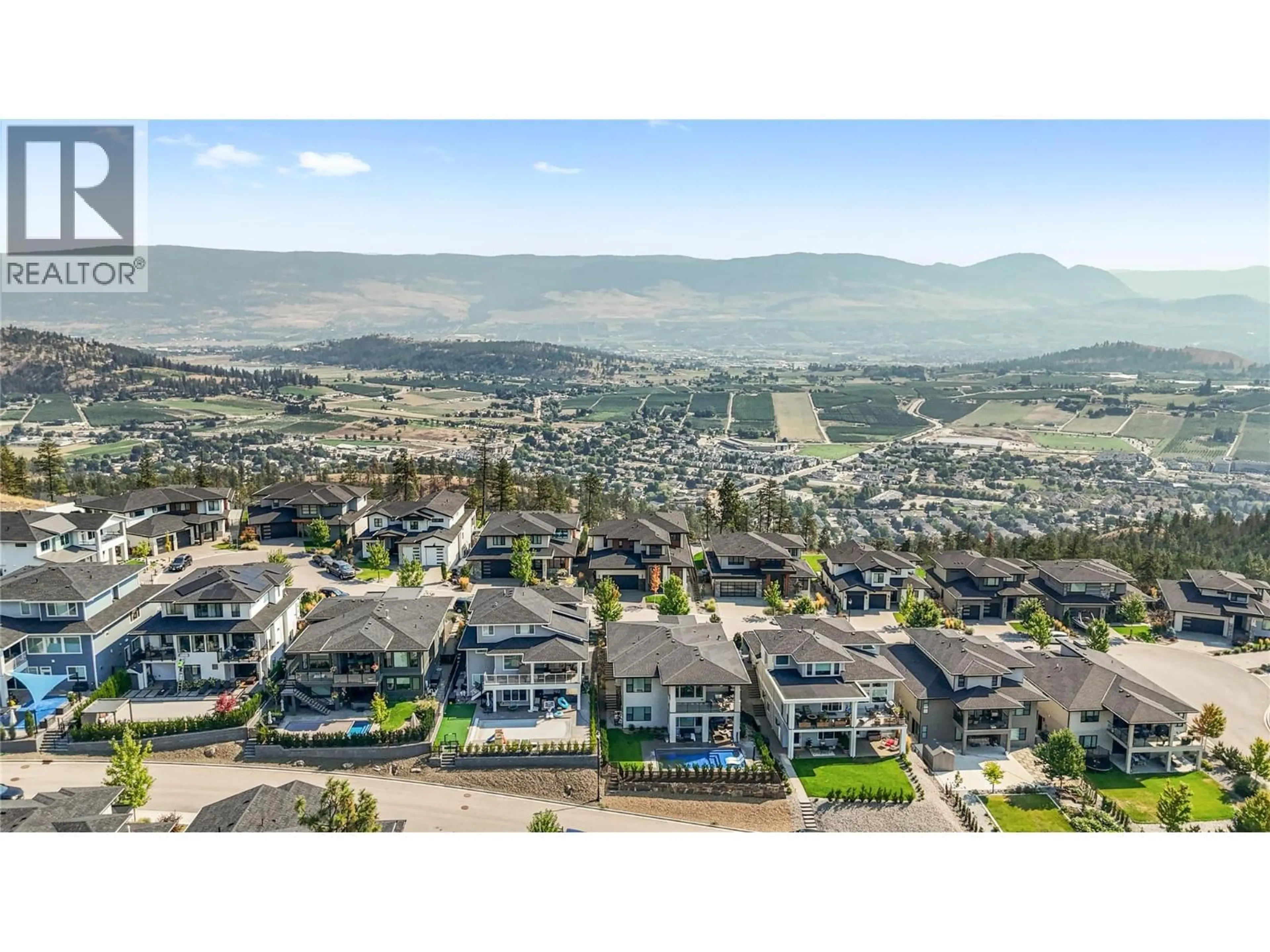 A pic from outside/outdoor area/front of a property/back of a property/a pic from drone, mountain view for 258 SUMMER WOOD DRIVE, Kelowna British Columbia V1V0C9