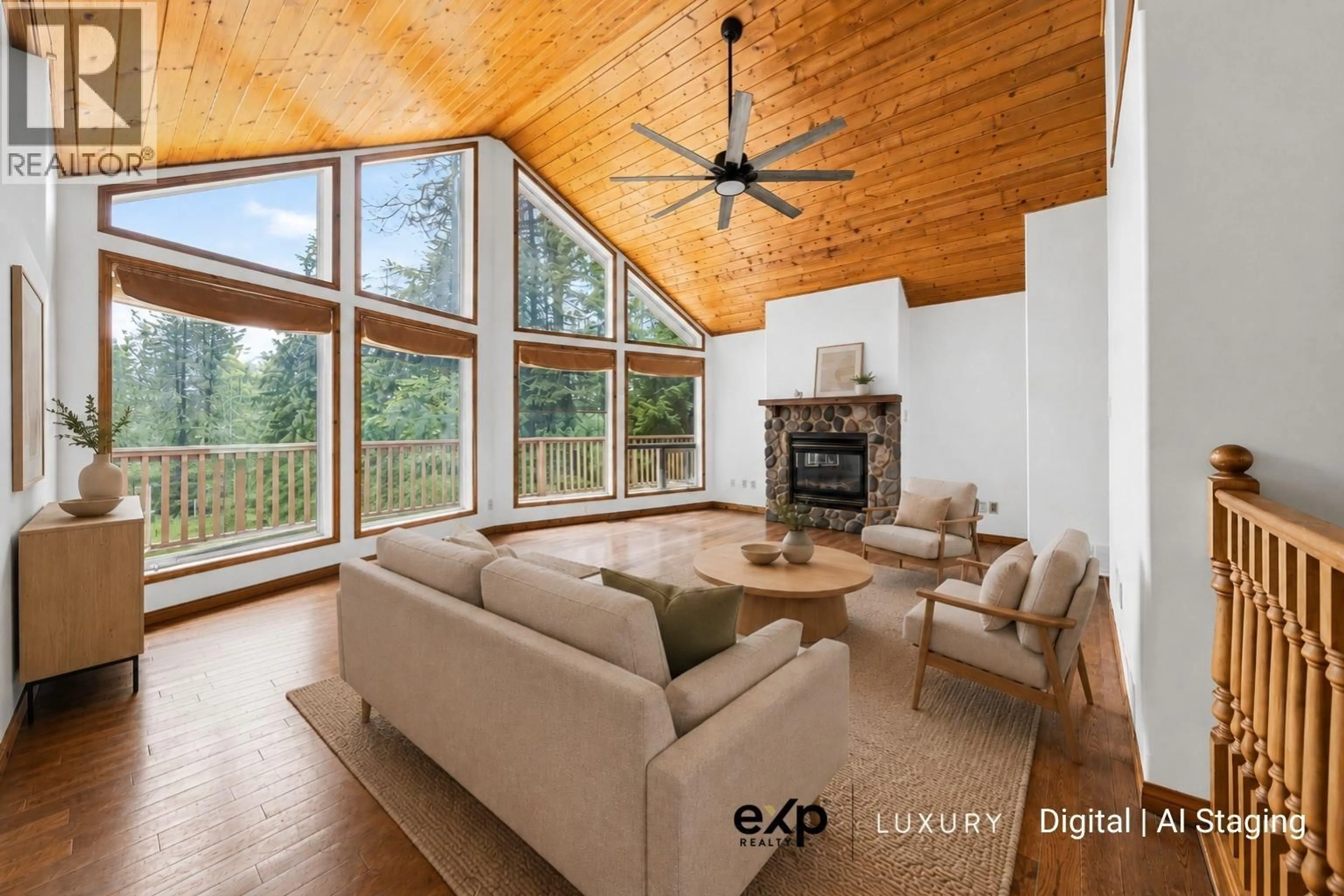 Living room with furniture, wood/laminate floor for 7259 OLSEN ROAD, Jaffray British Columbia V0B1T0