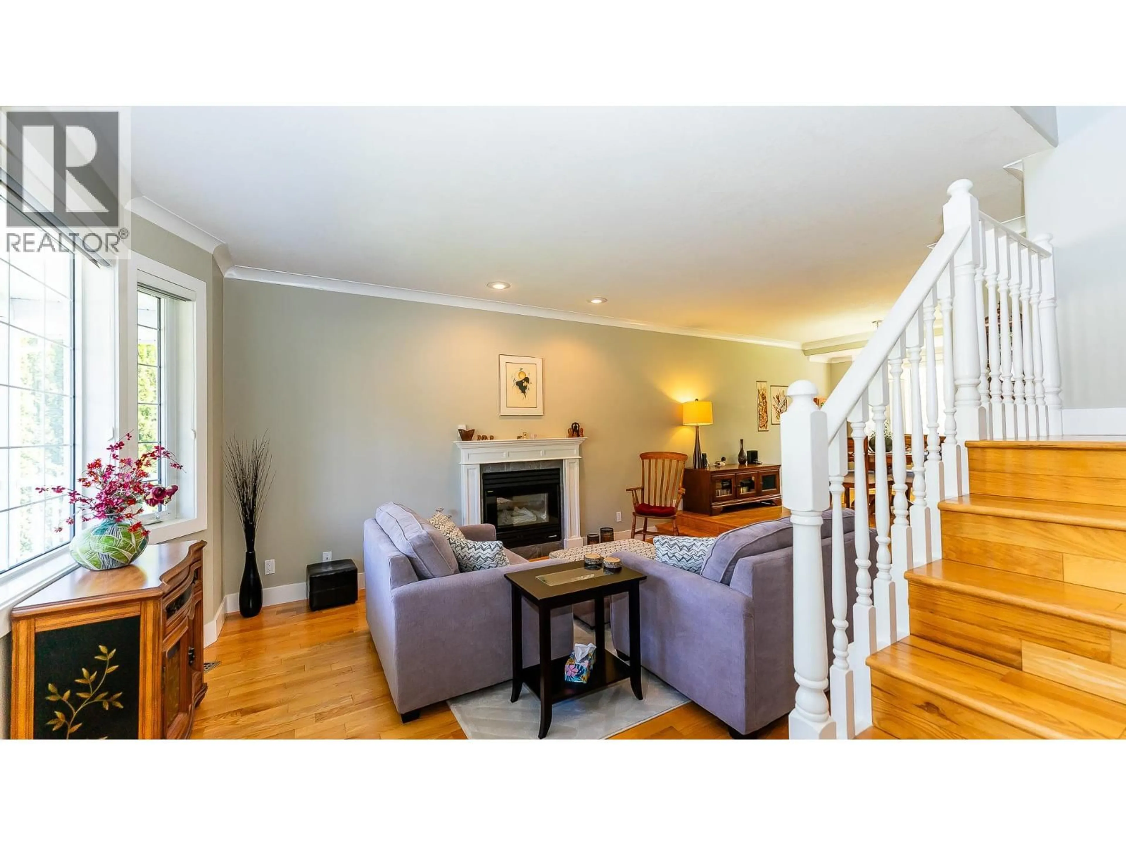 Living room with furniture, wood/laminate floor for 813 EIGHTH STREET EAST, Revelstoke British Columbia V0E2S0