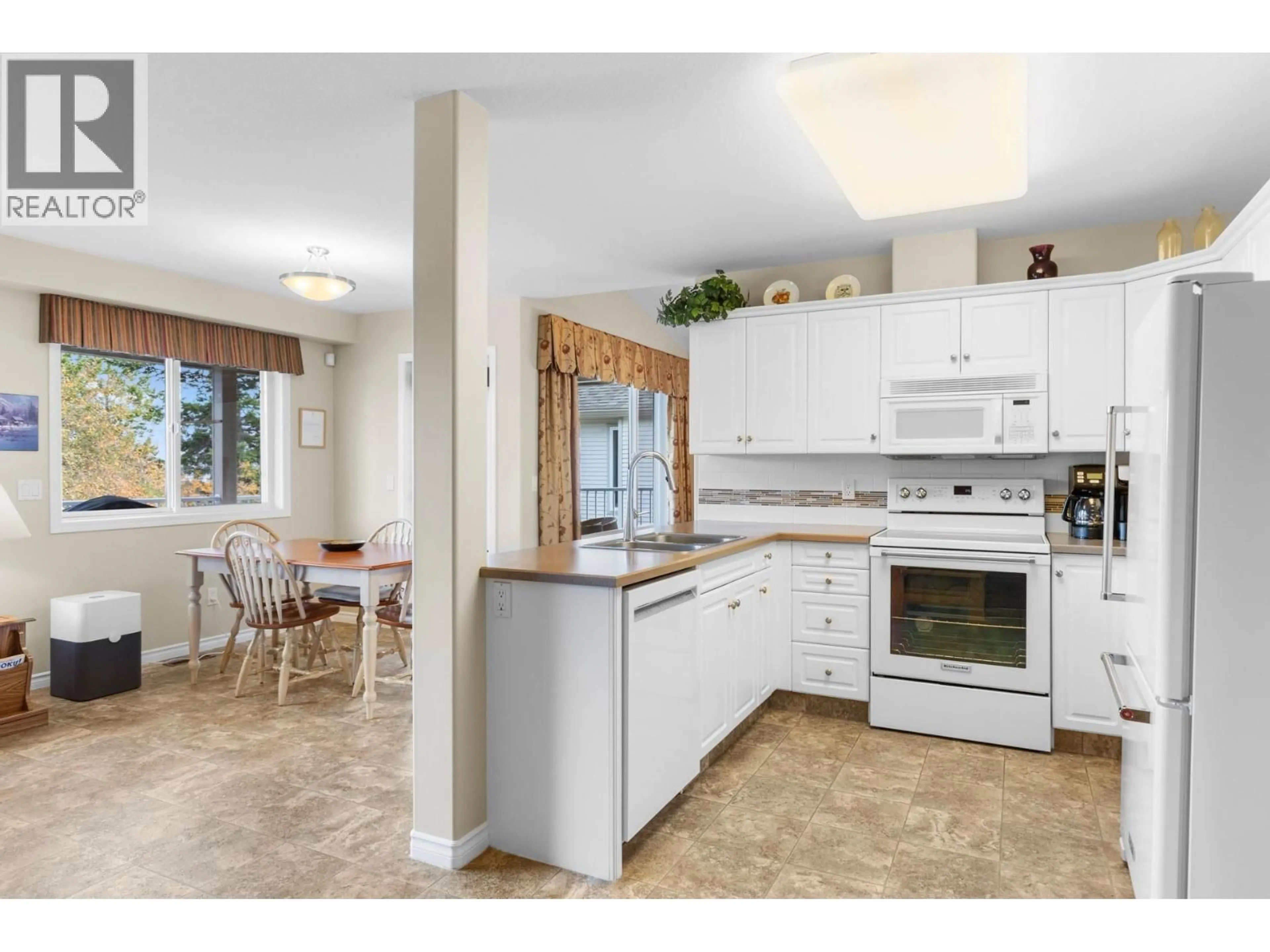 Open concept kitchen, ceramic/tile floor for 3849 GLEN CANYON DRIVE, West Kelowna British Columbia V4T2P8