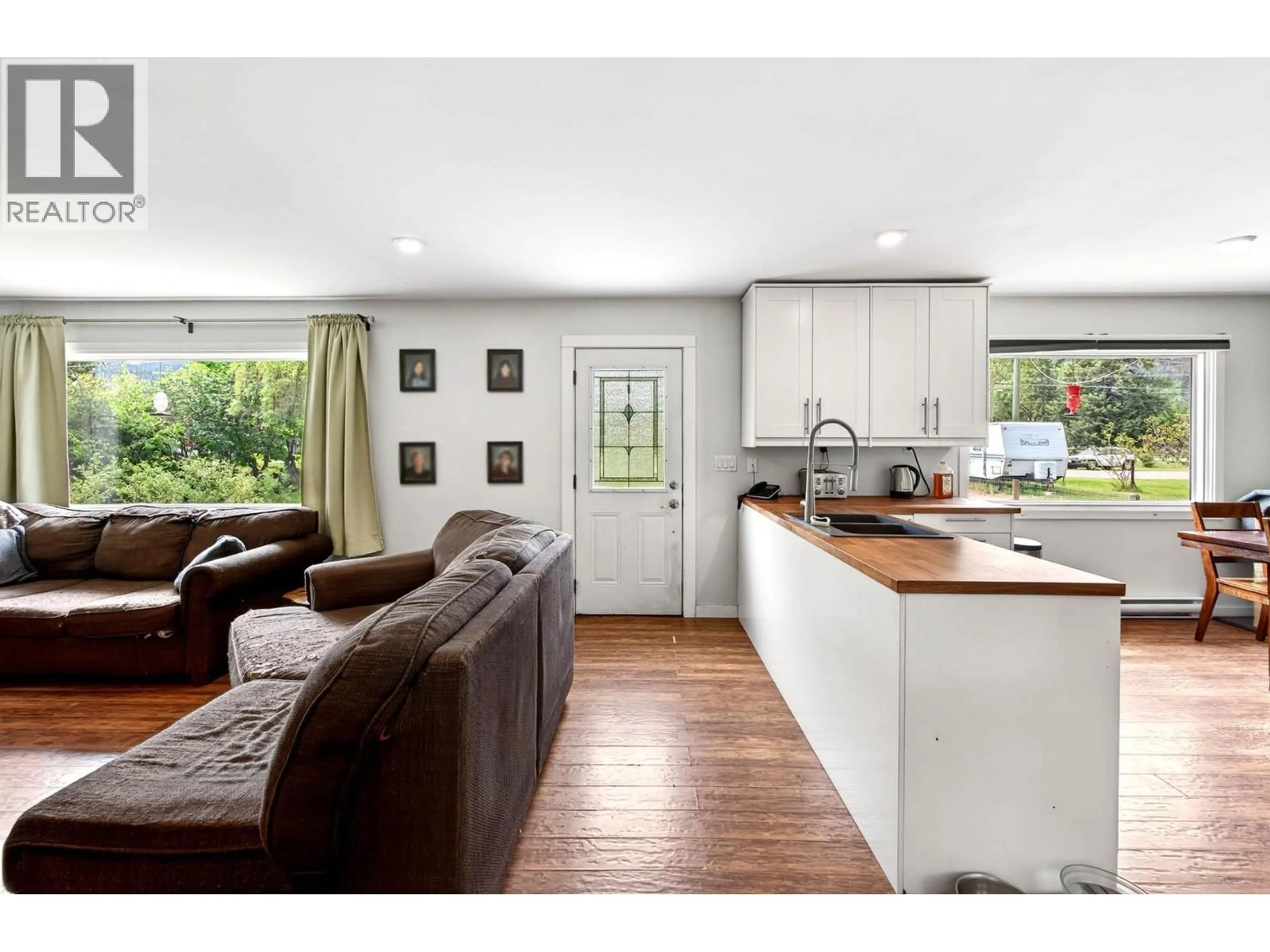 Open concept kitchen, wood/laminate floor for 1256 HERN ROAD, Clearwater British Columbia V0E1N2