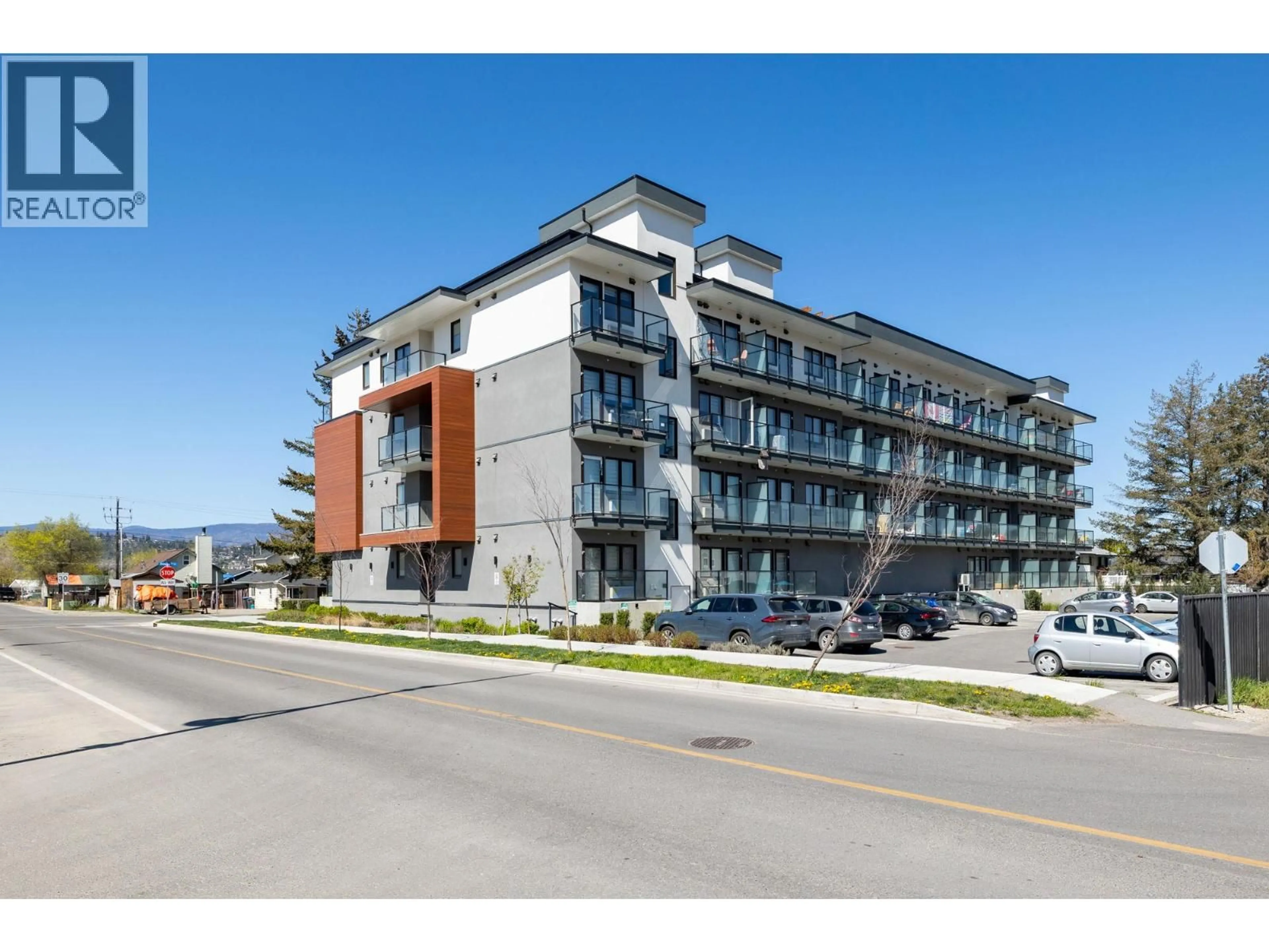 A pic from outside/outdoor area/front of a property/back of a property/a pic from drone, building for 218 - 345 DOUGALL ROAD NORTH, Kelowna British Columbia V1X0A8