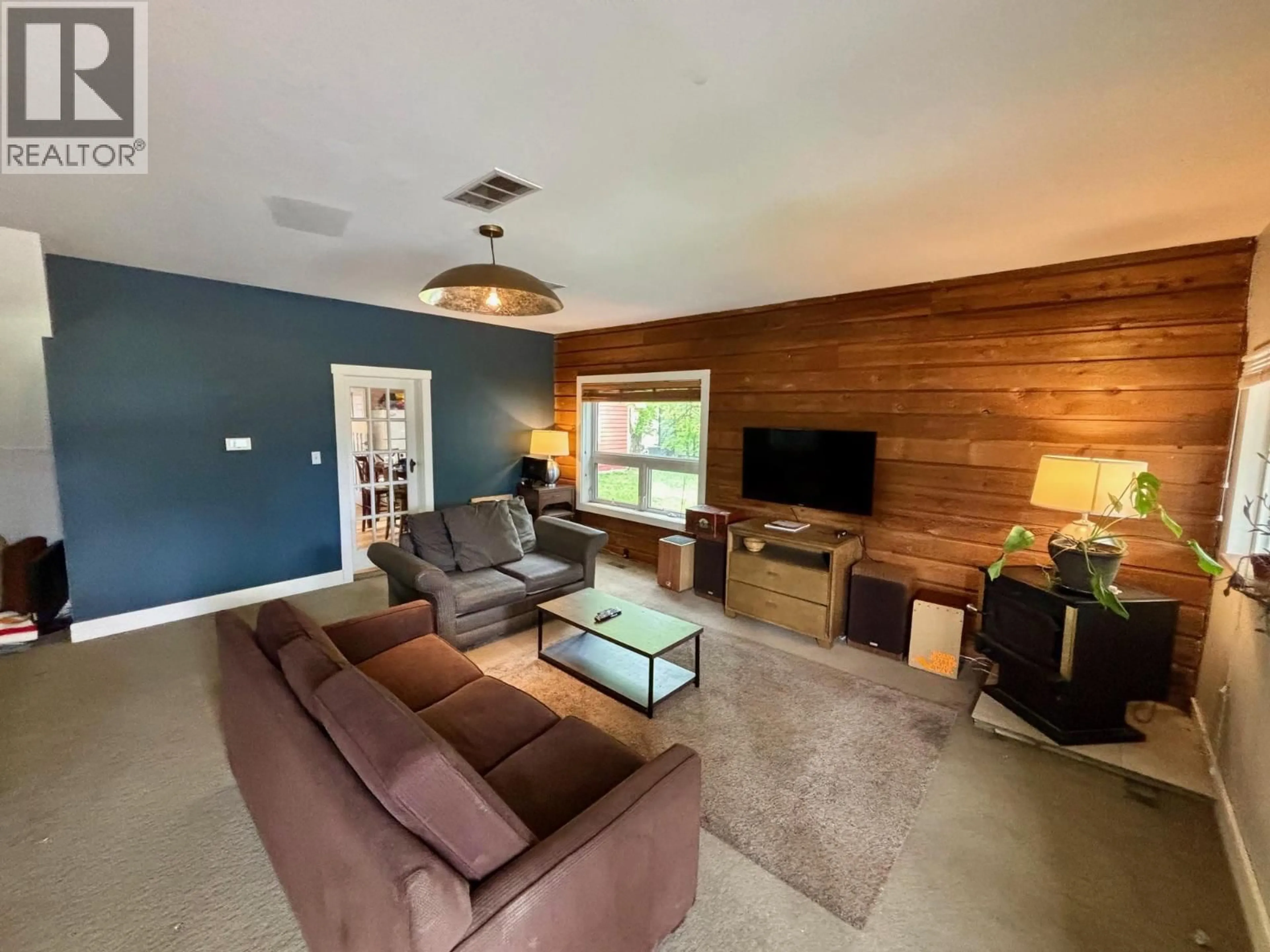 Living room with furniture, unknown for 408 THIRD STREET WEST, Revelstoke British Columbia V0E2S0