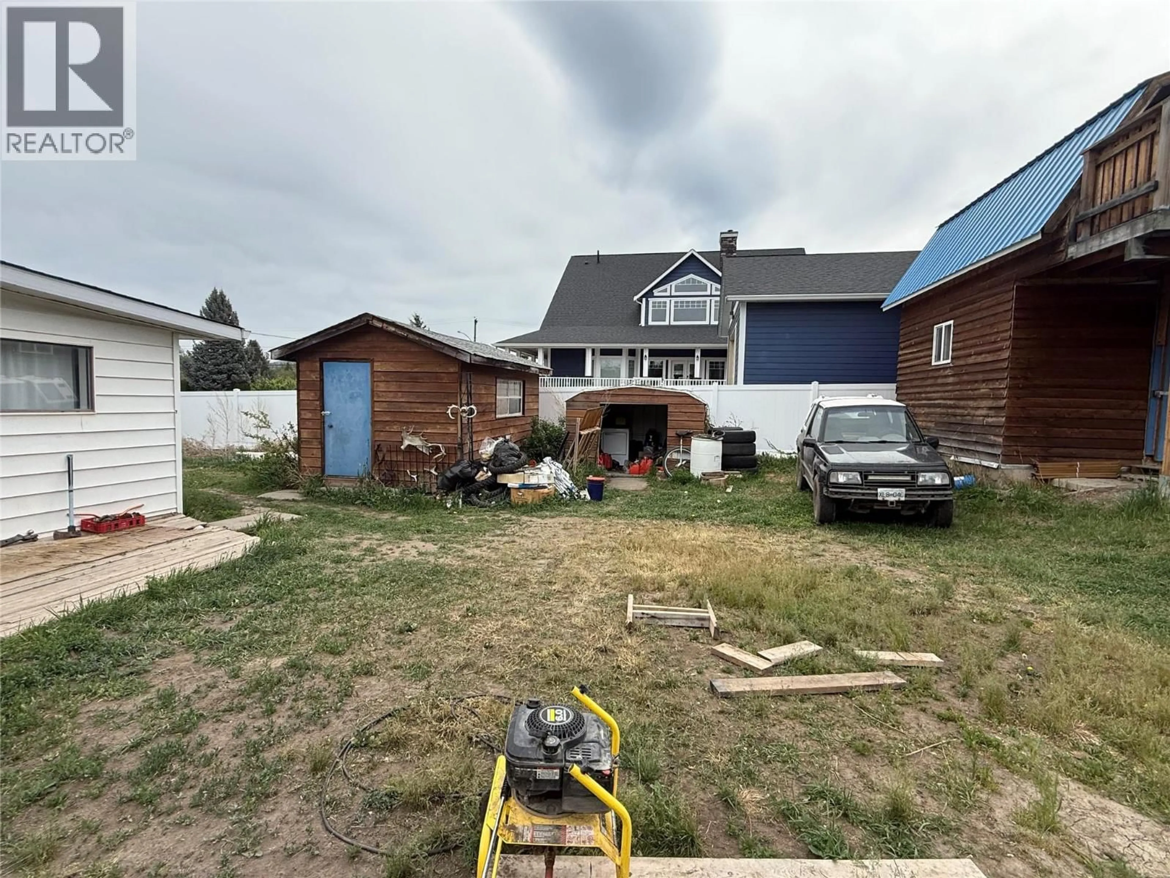 A pic from outside/outdoor area/front of a property/back of a property/a pic from drone, unknown for 1417 FIR AVENUE, Merritt British Columbia V1K1L1