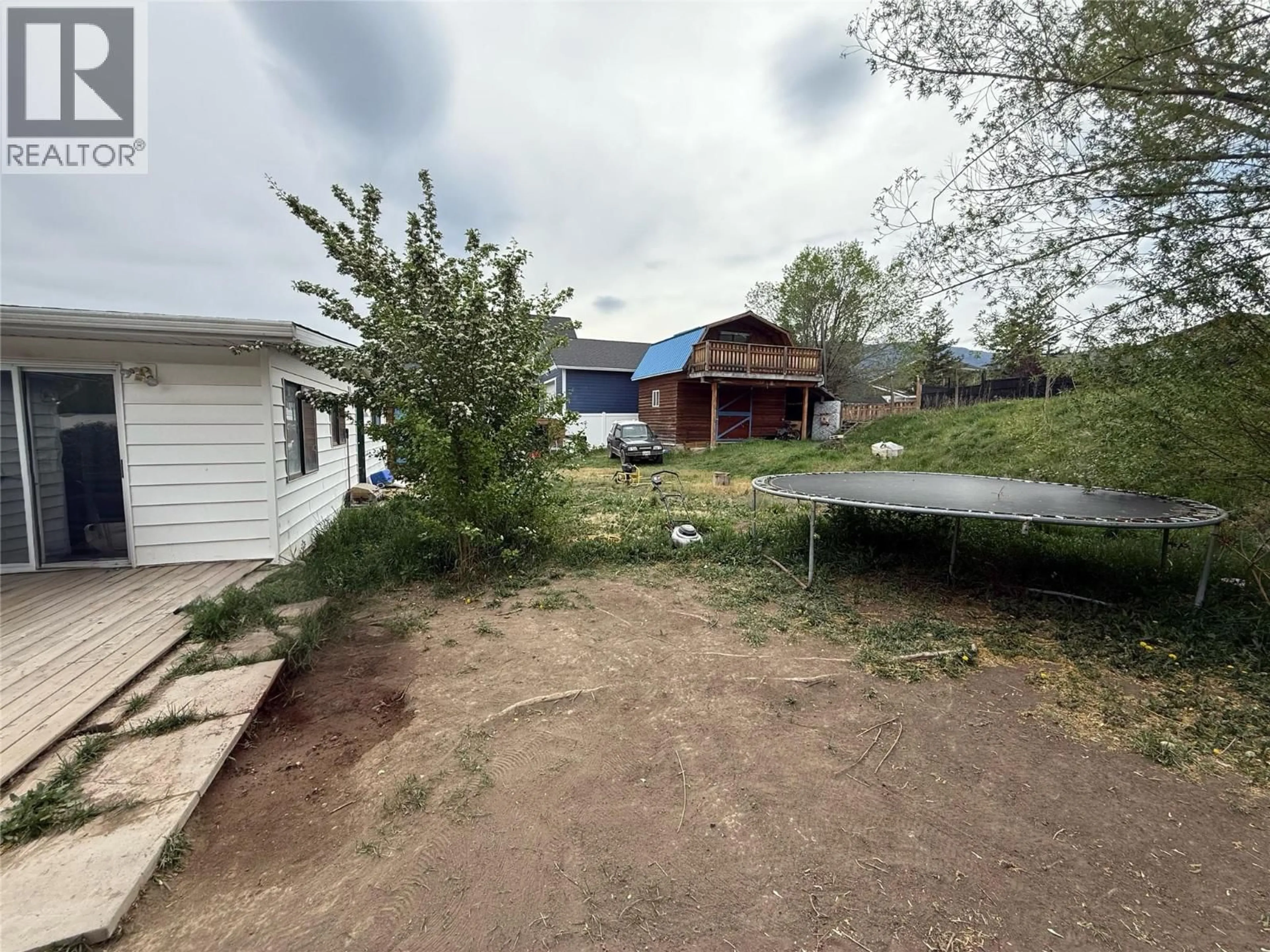 A pic from outside/outdoor area/front of a property/back of a property/a pic from drone, unknown for 1417 FIR AVENUE, Merritt British Columbia V1K1L1