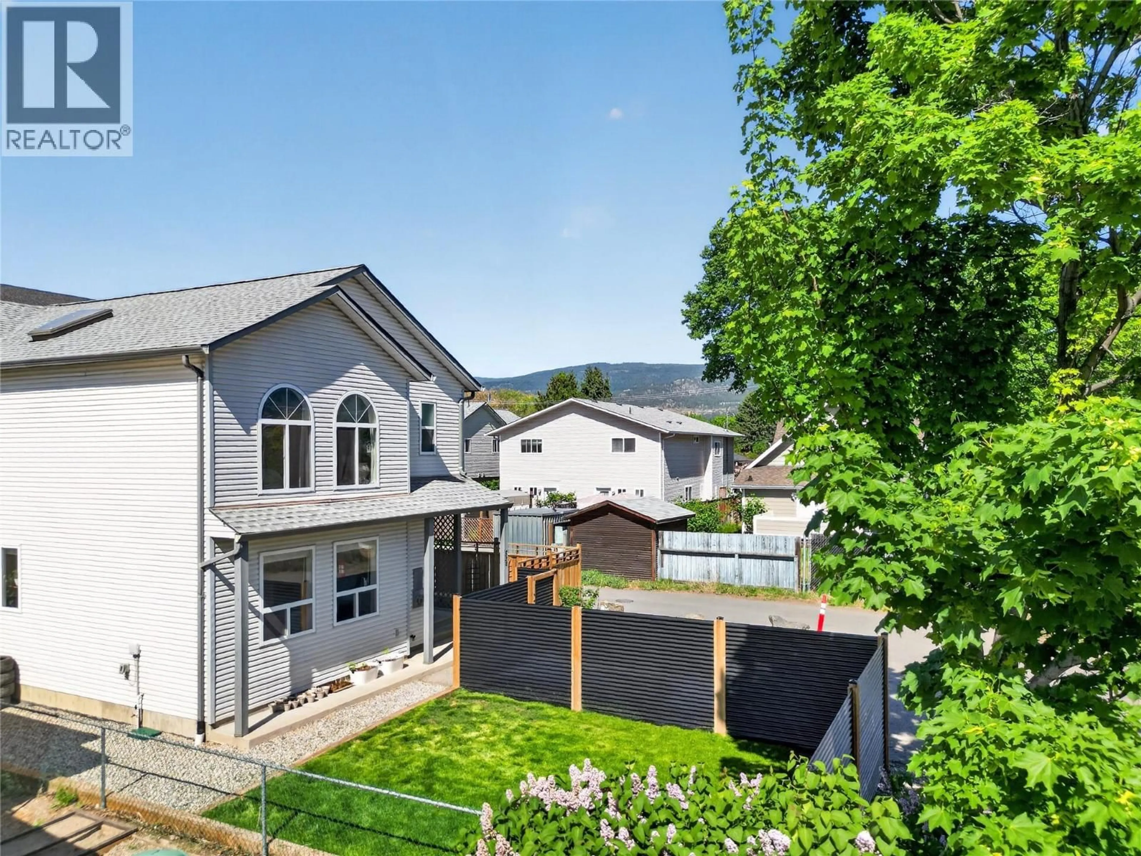 A pic from outside/outdoor area/front of a property/back of a property/a pic from drone, street for 102 - 538 ALBERTA AVENUE, Penticton British Columbia V2A1P6